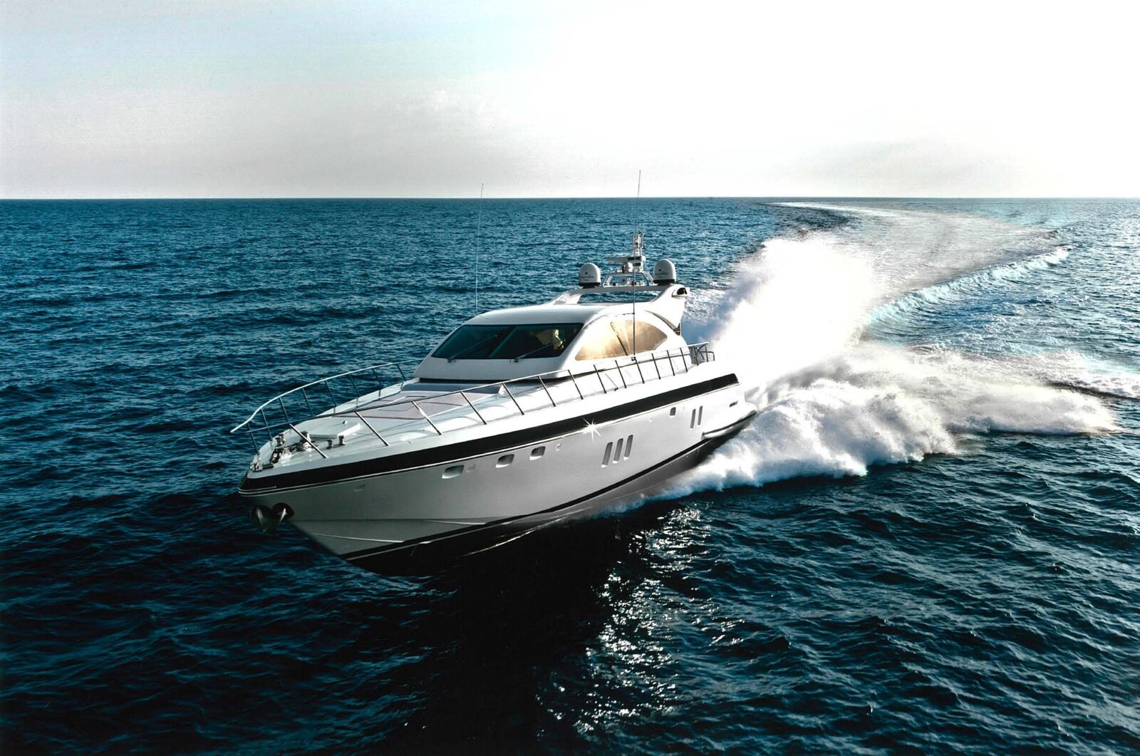 Mangusta Yacht cruising at high speed on open sea
