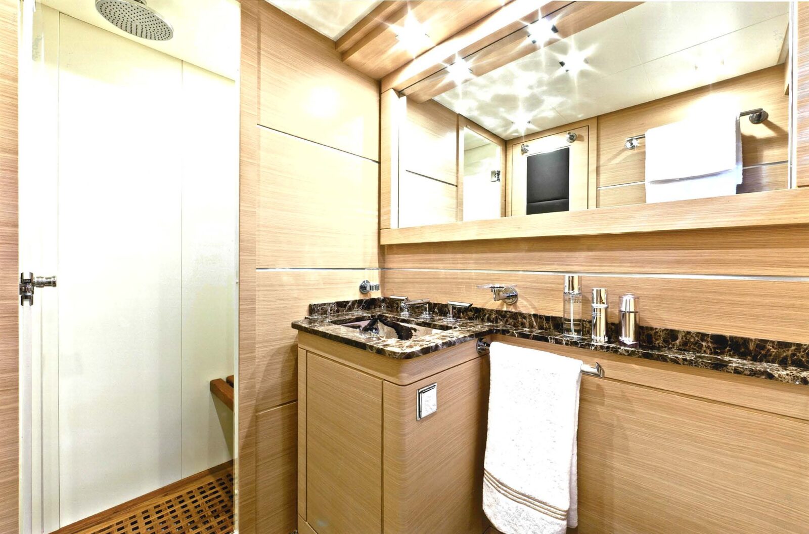 Luxury yacht bathroom with marble counter.