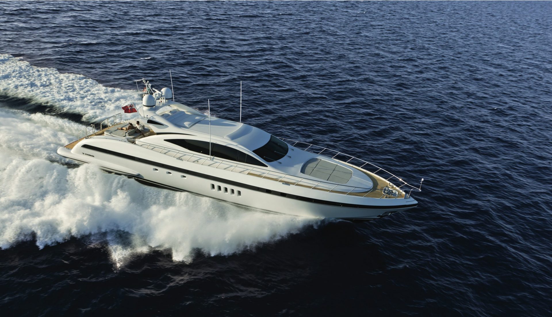 Mangusta yacht gliding swiftly on open sea