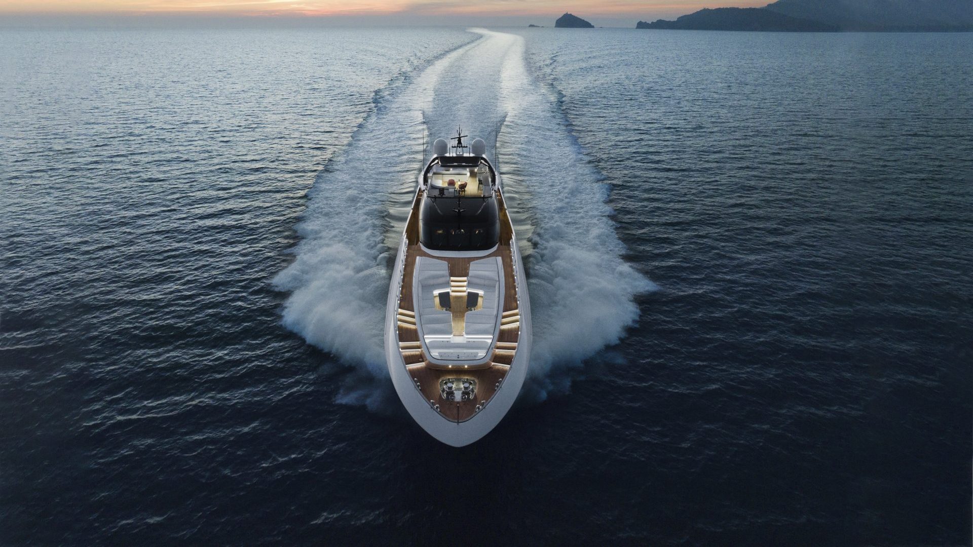 Mangusta Yachts cruising at sunset