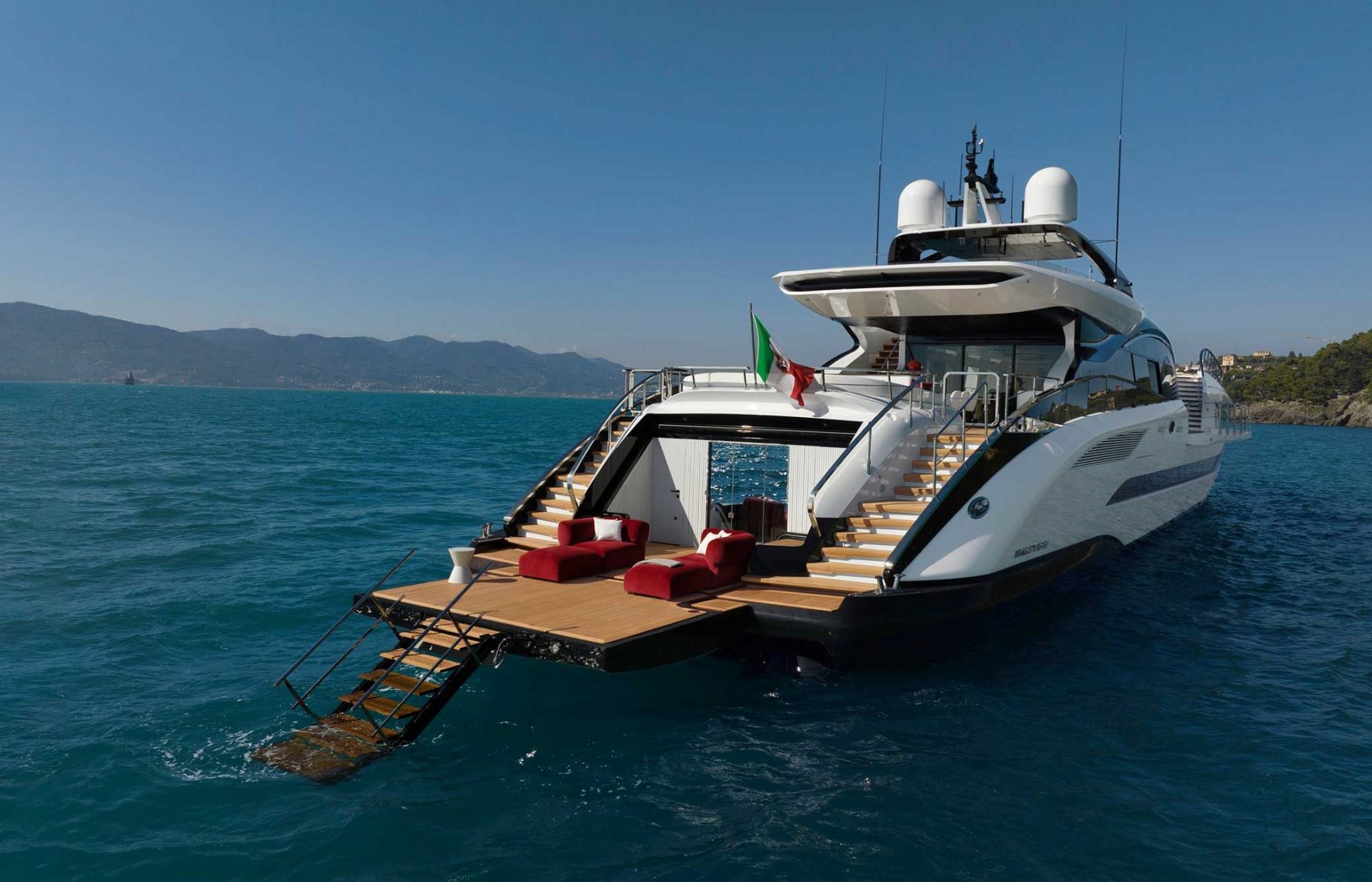 Luxury Mangusta Yacht cruising on blue waters