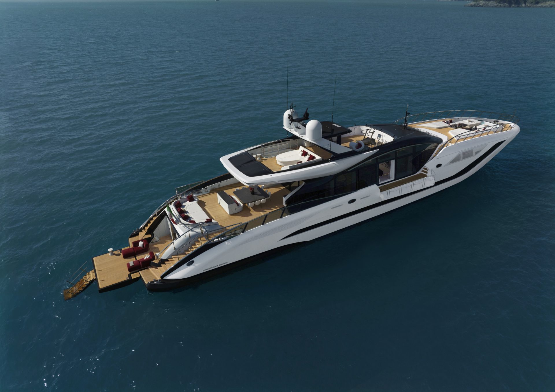 Luxury Mangusta yacht on open sea view.