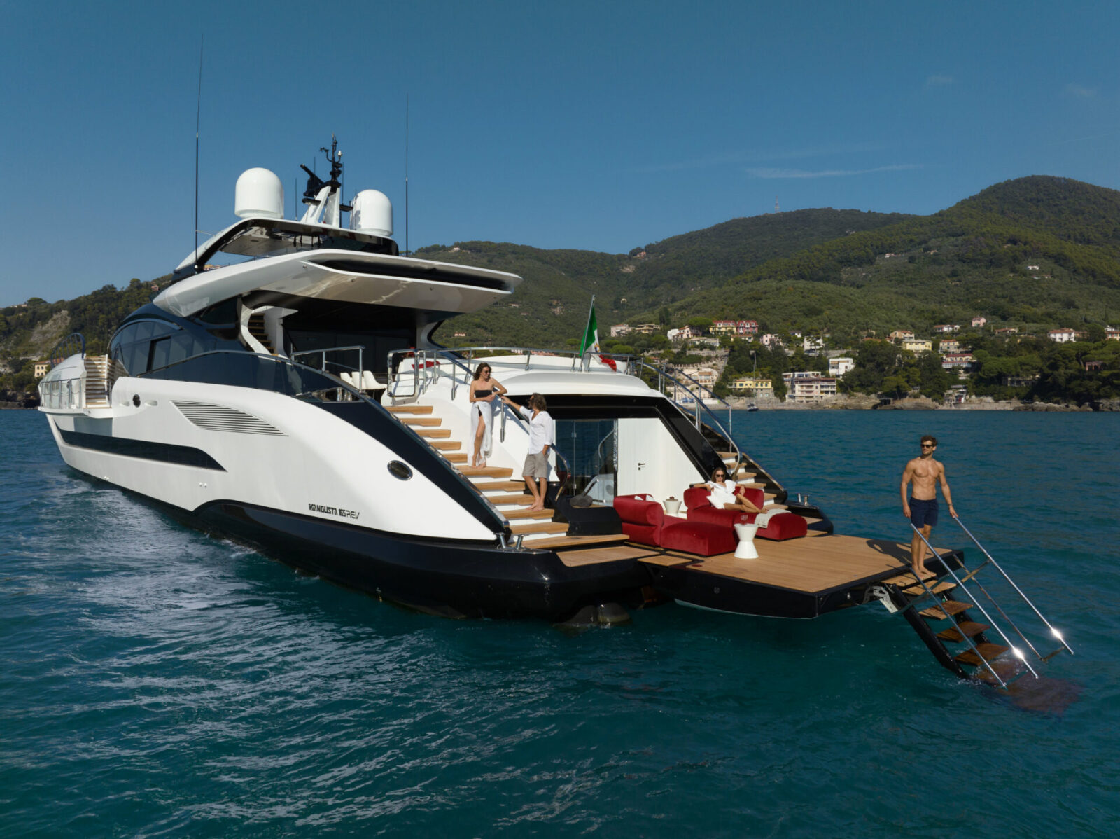 Mangusta yacht on turquoise sea, luxury lifestyle.