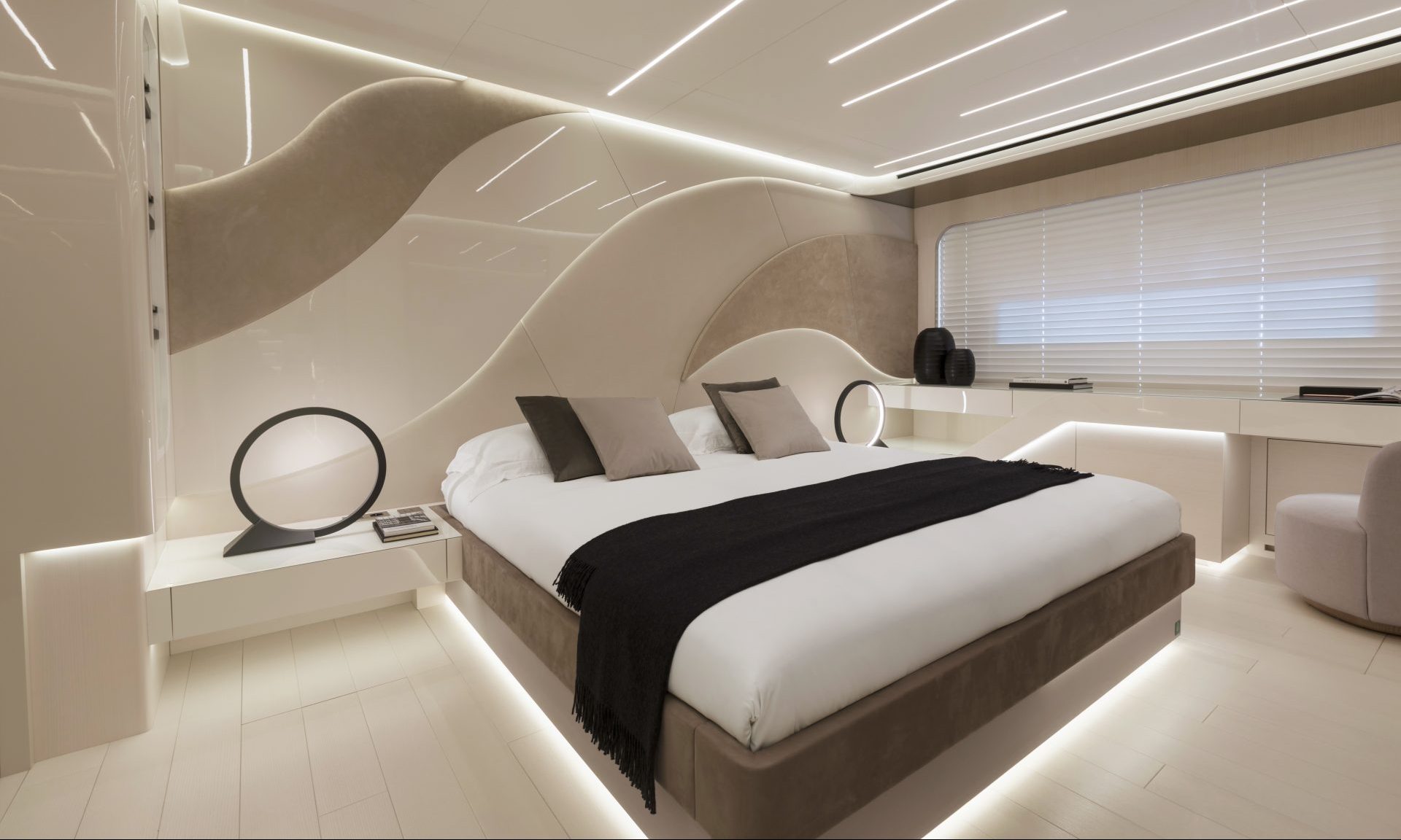 Luxurious yacht bedroom with modern design.