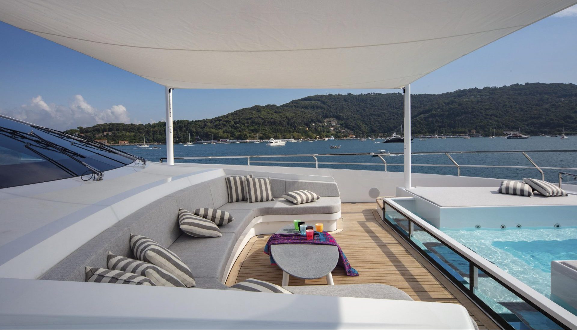 Luxurious yacht deck with seating and sea view