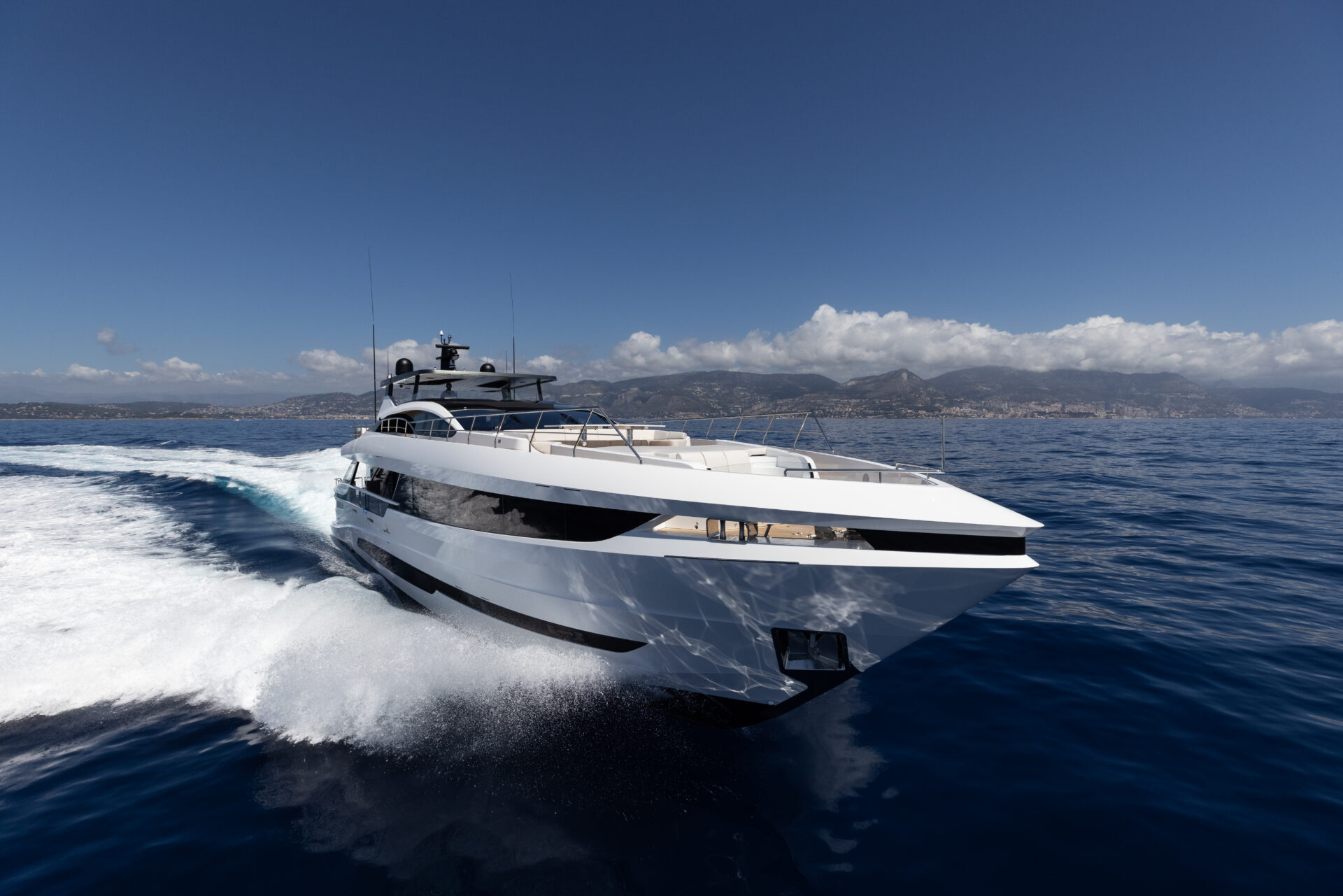 Luxury Mangusta yacht cruising at sea