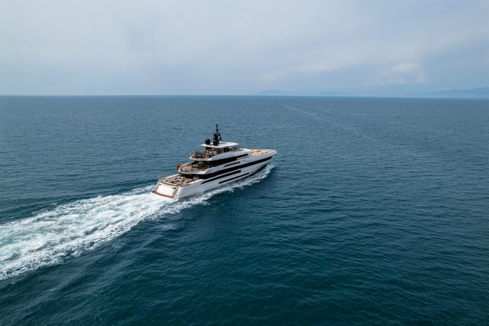 Luxury Mangusta Yacht cruising at sea