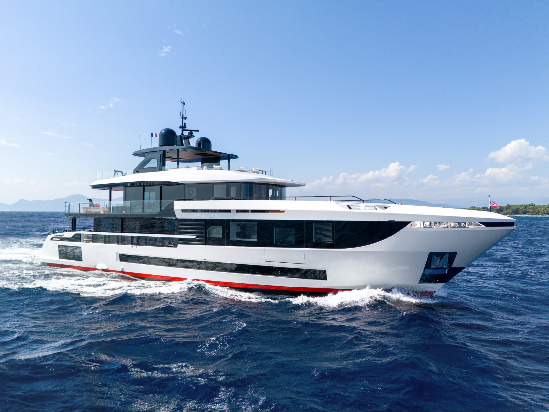 Luxury Mangusta yacht cruising on open sea