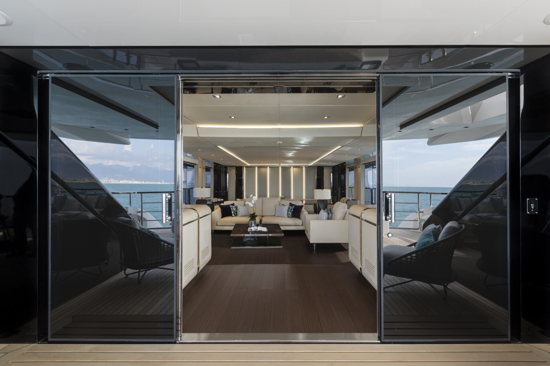 Luxurious yacht interior with ocean view.