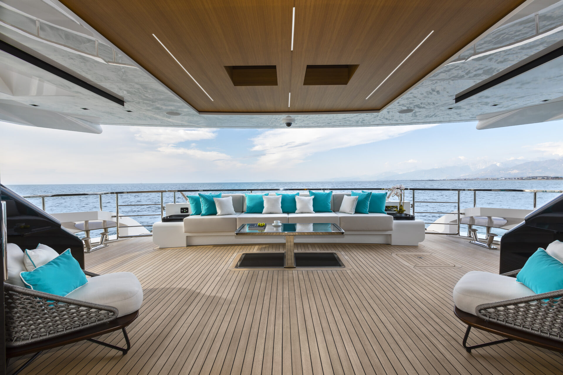 Luxurious yacht deck with ocean view and cushions