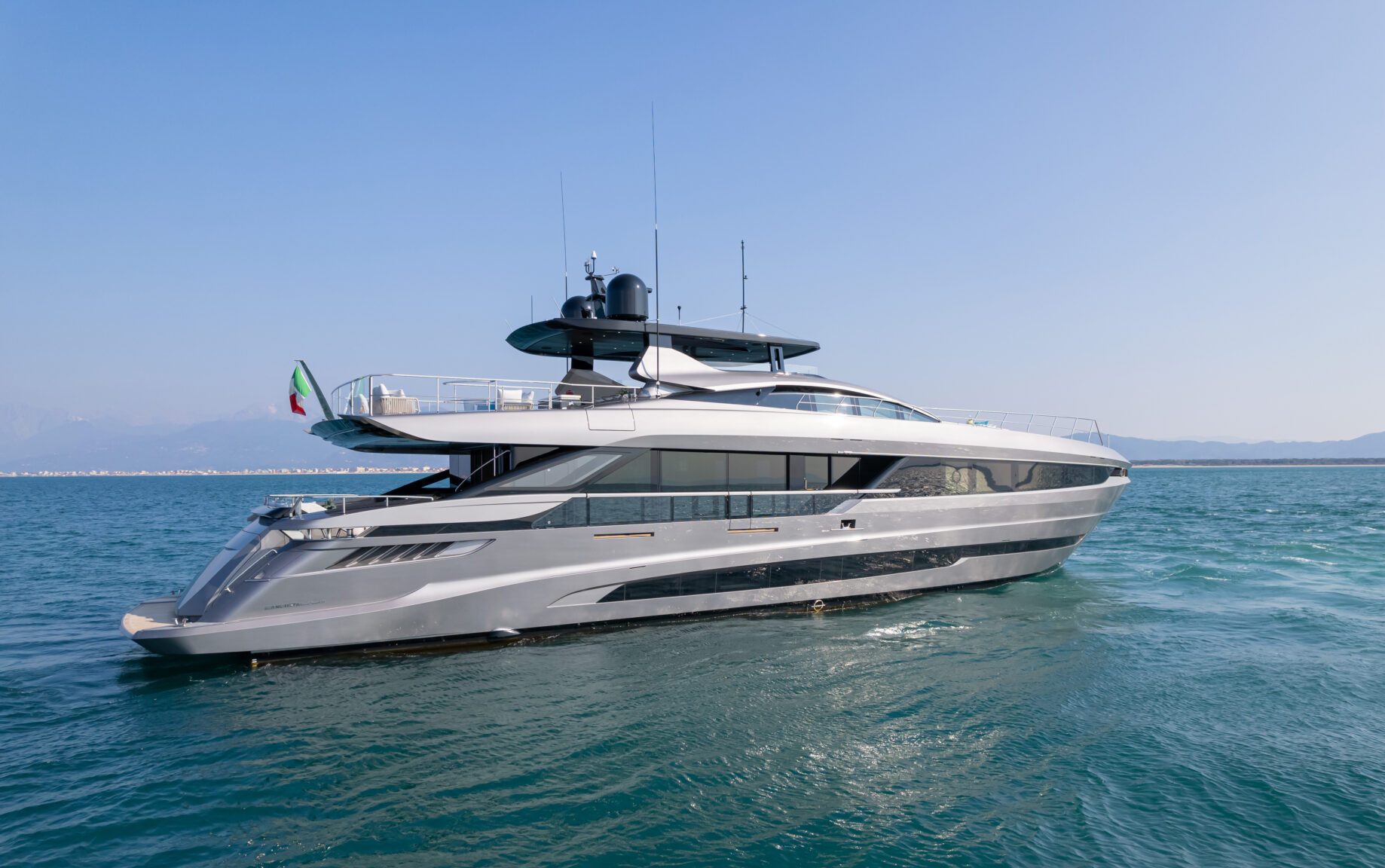 Mangusta yacht on tranquil sea with clear skies