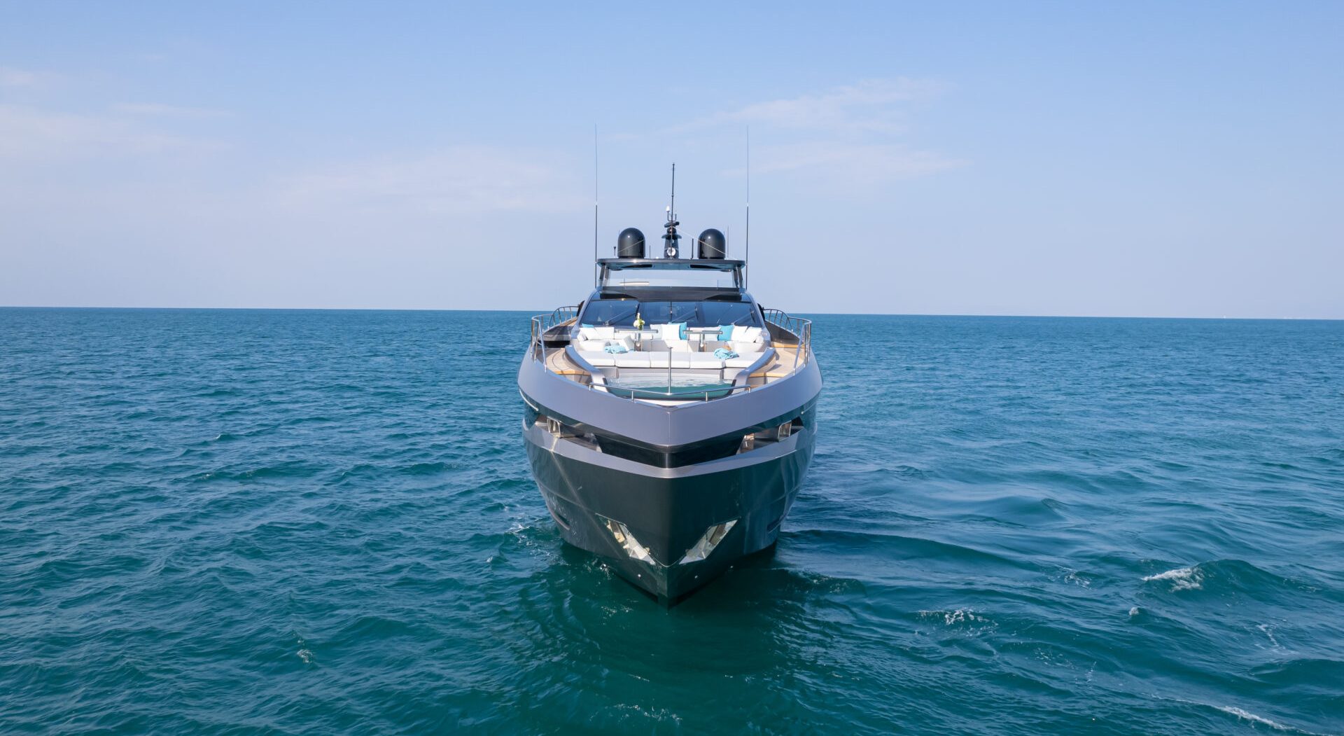 Mangusta yacht cruising on open sea.