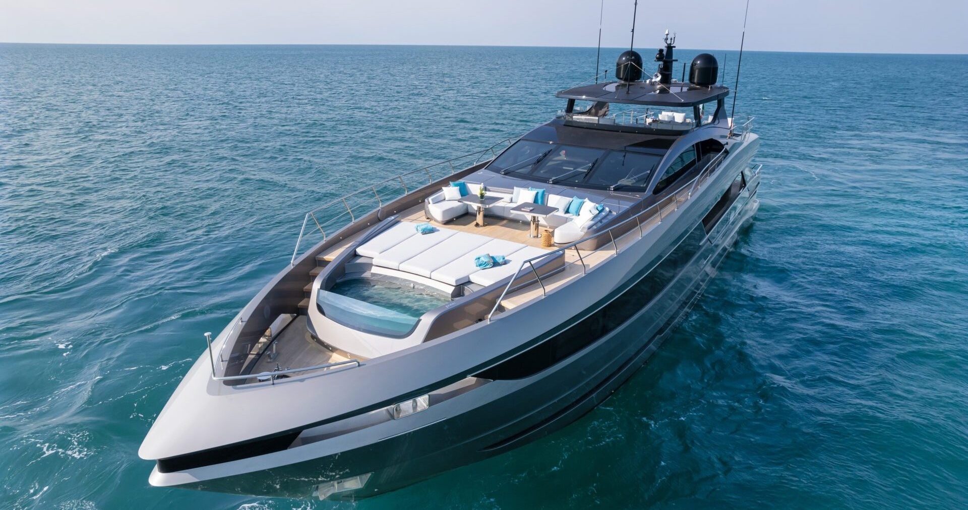 Luxurious Mangusta yacht cruising at sea