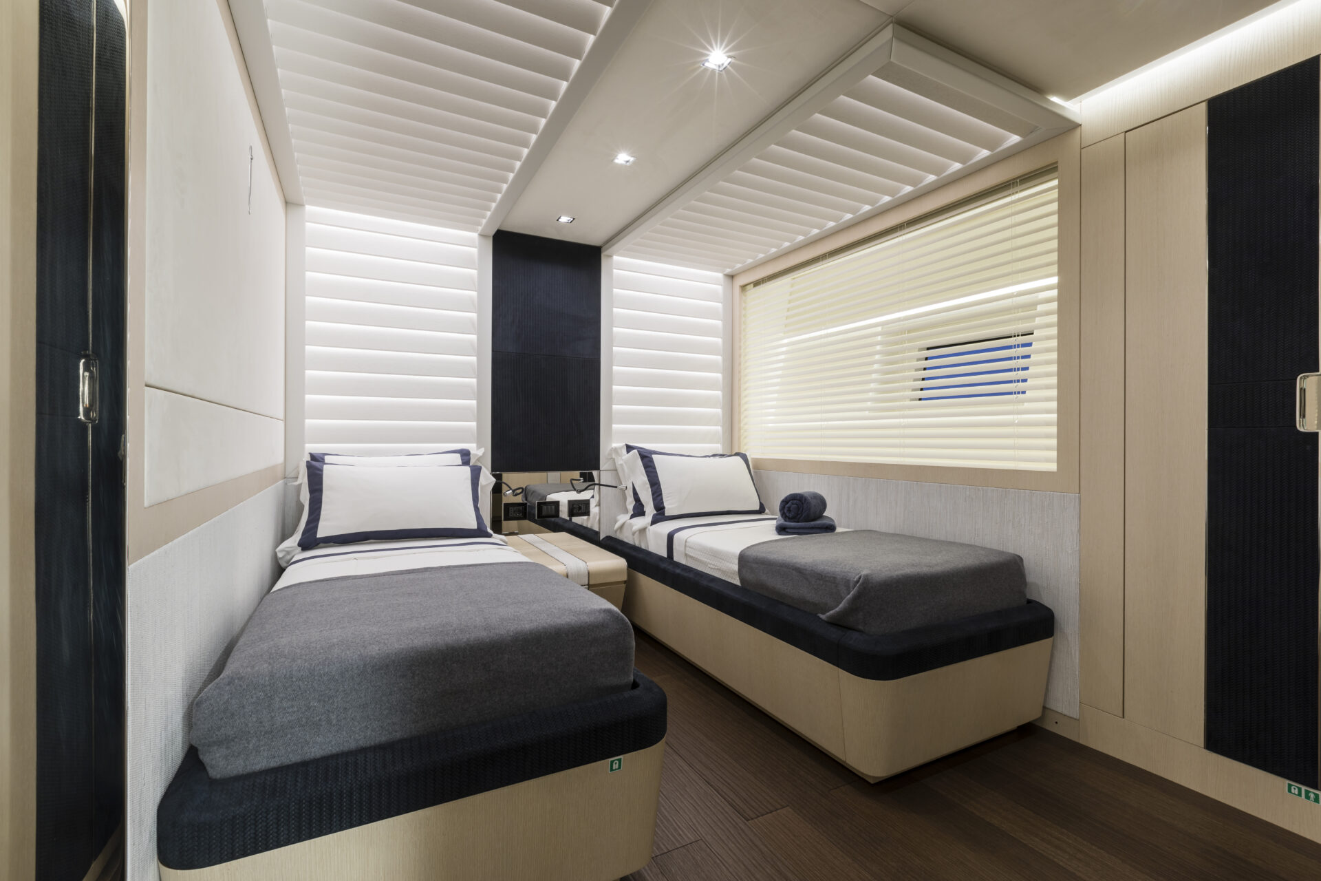 Luxurious twin cabin on a Mangusta yacht