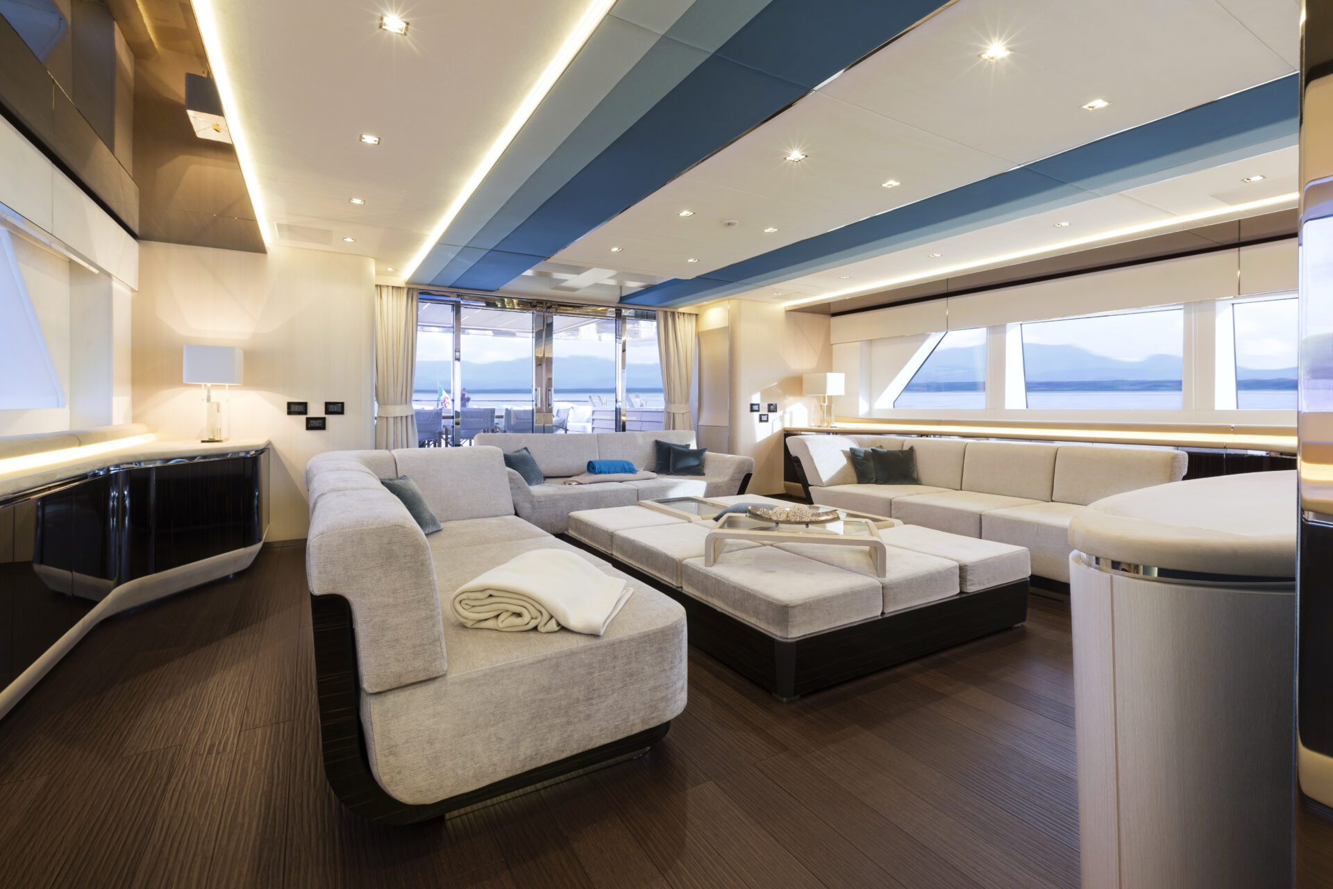 Luxurious yacht living room with ocean view.