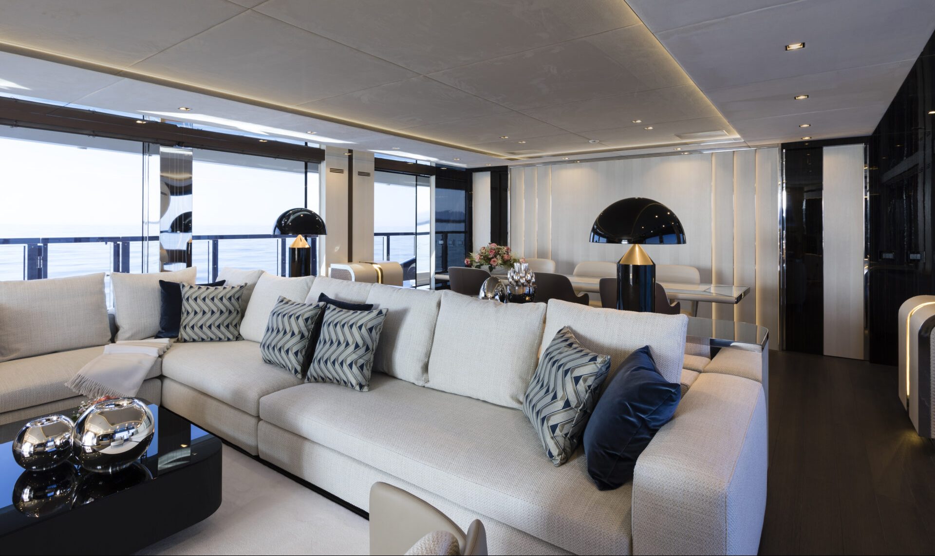 Luxurious Mangusta yacht interior lounge area.
