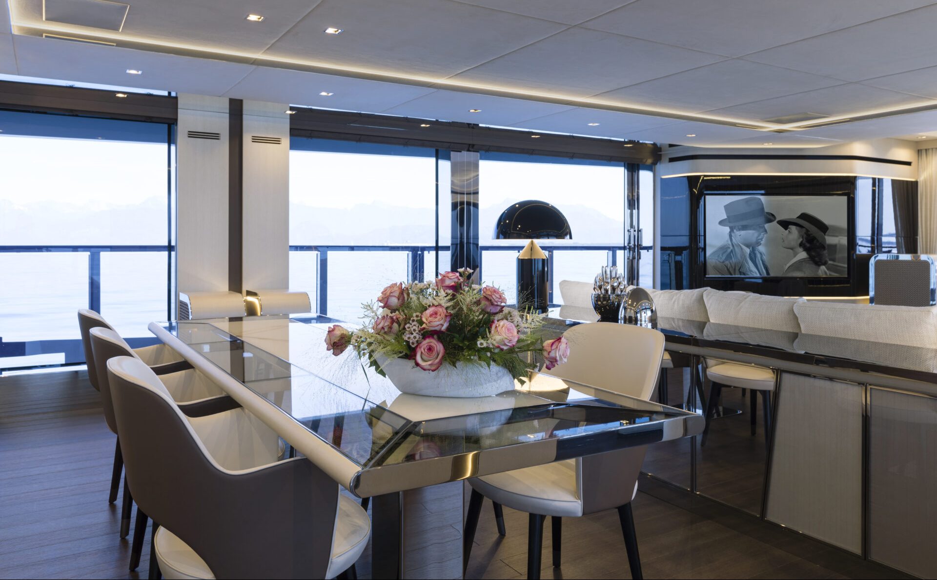 Luxurious yacht dining room with ocean view.