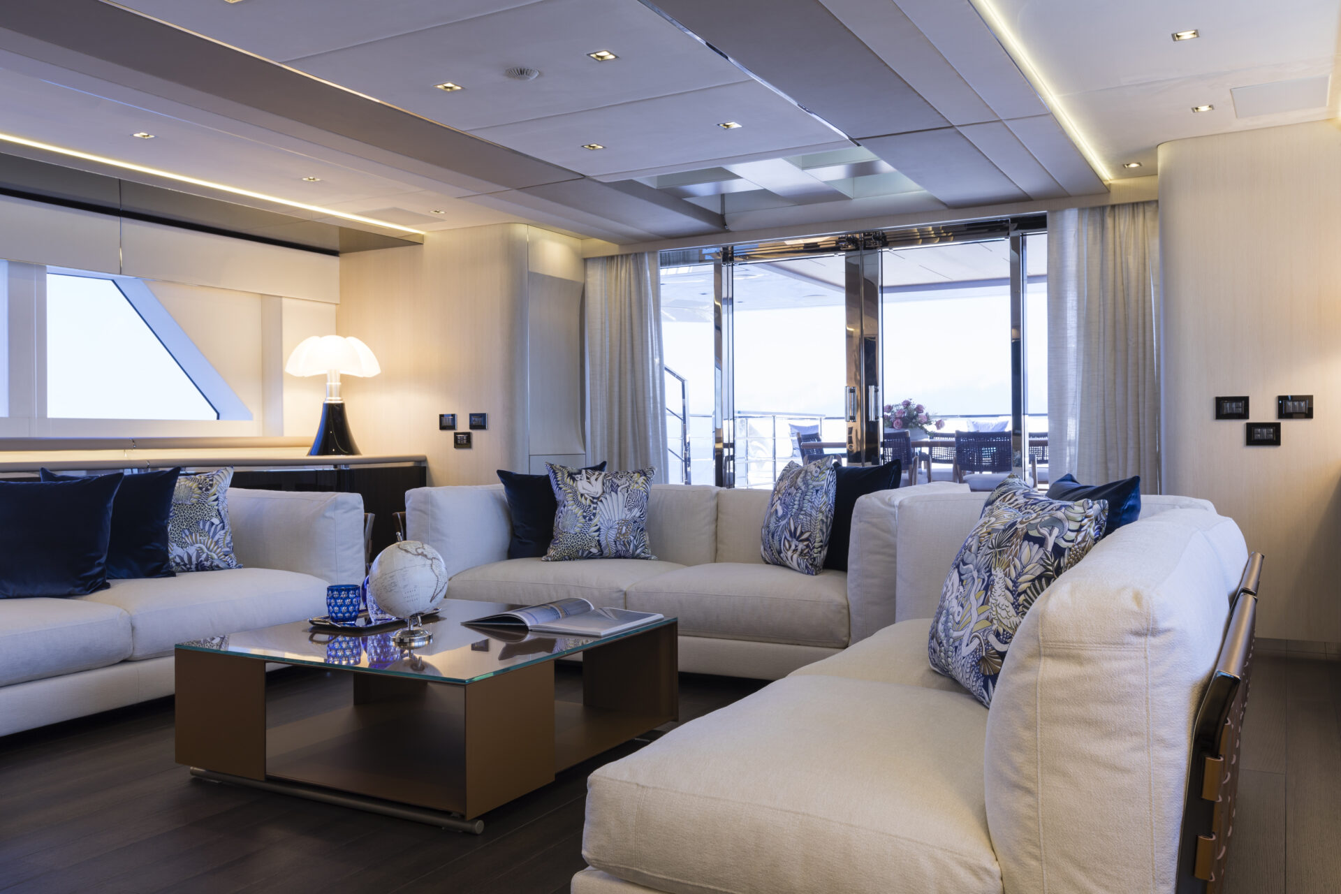 Luxurious yacht salon with elegant décor.