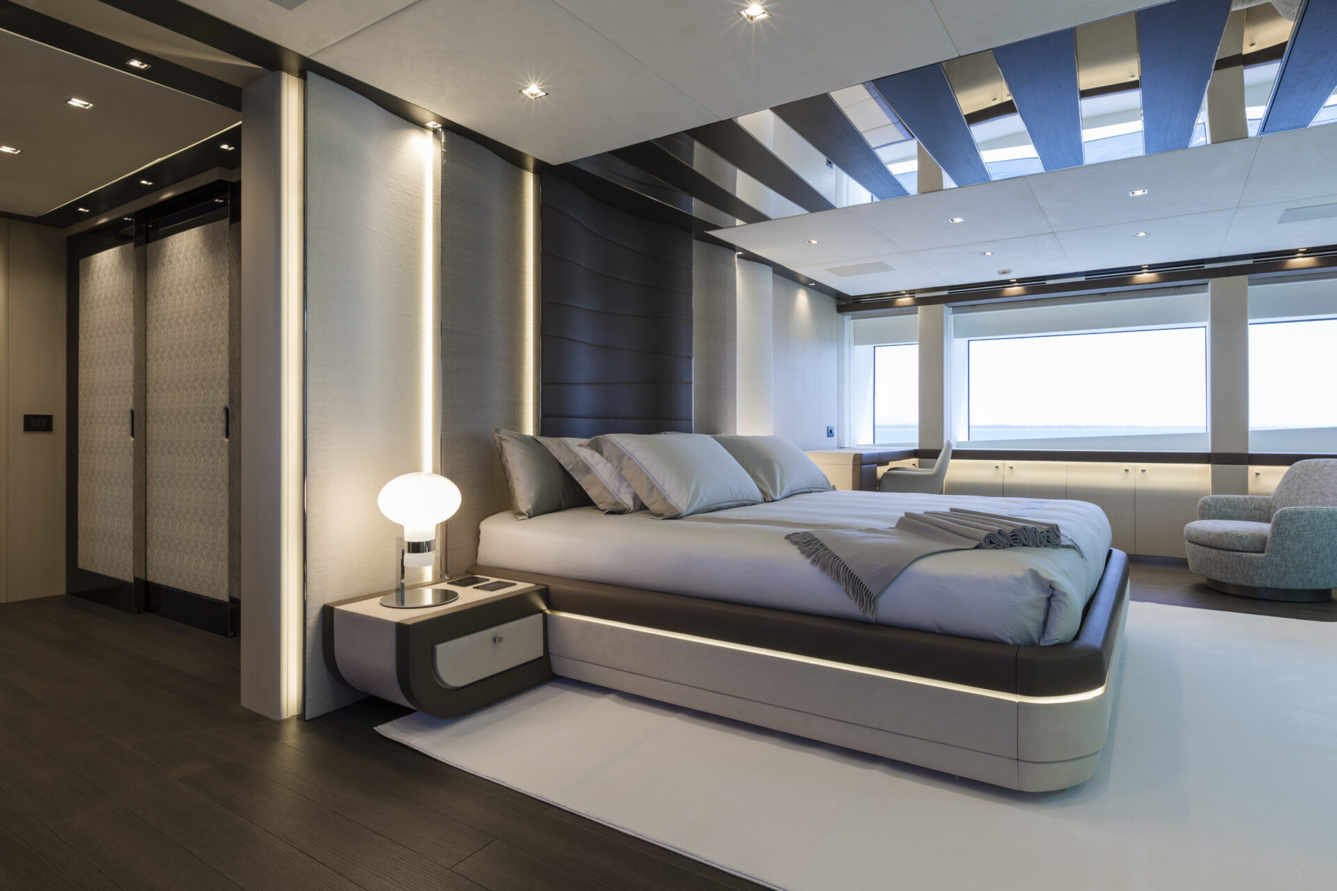 Luxurious yacht bedroom with modern design.