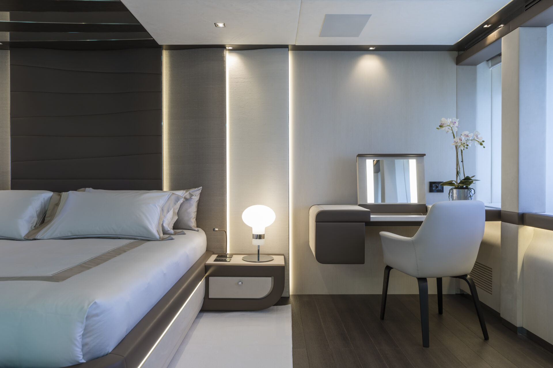 Luxury yacht cabin with modern decor.