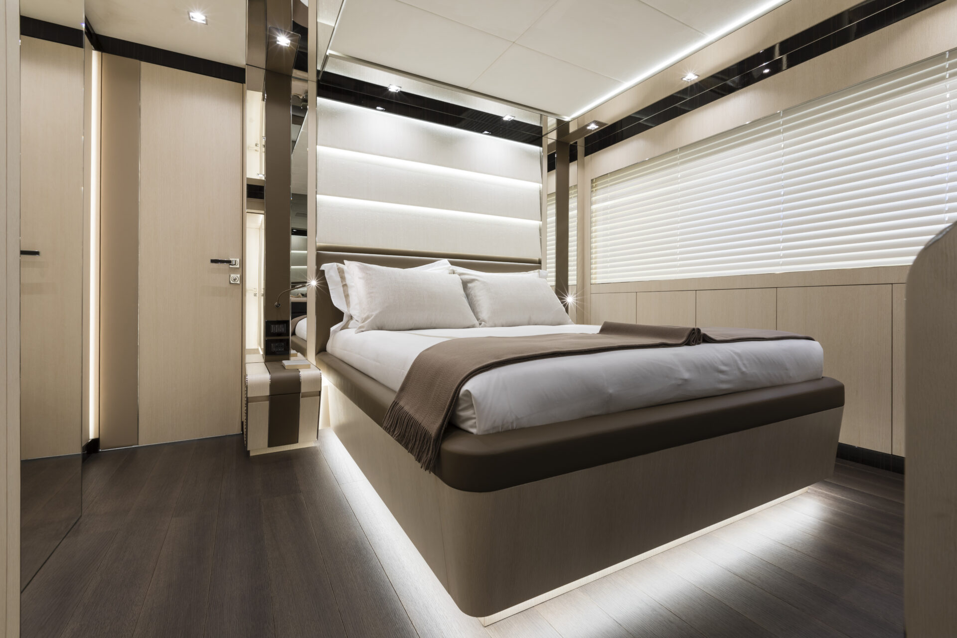 Luxurious bedroom interior on Mangusta Yacht