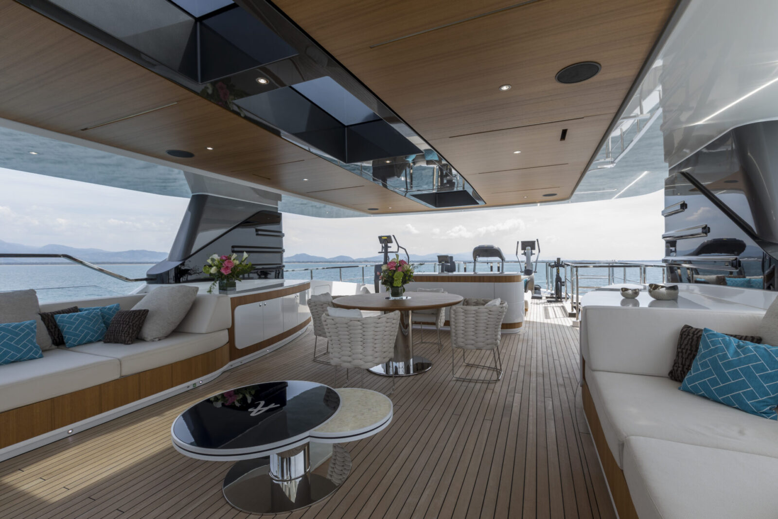 Luxurious outdoor deck on Mangusta yacht