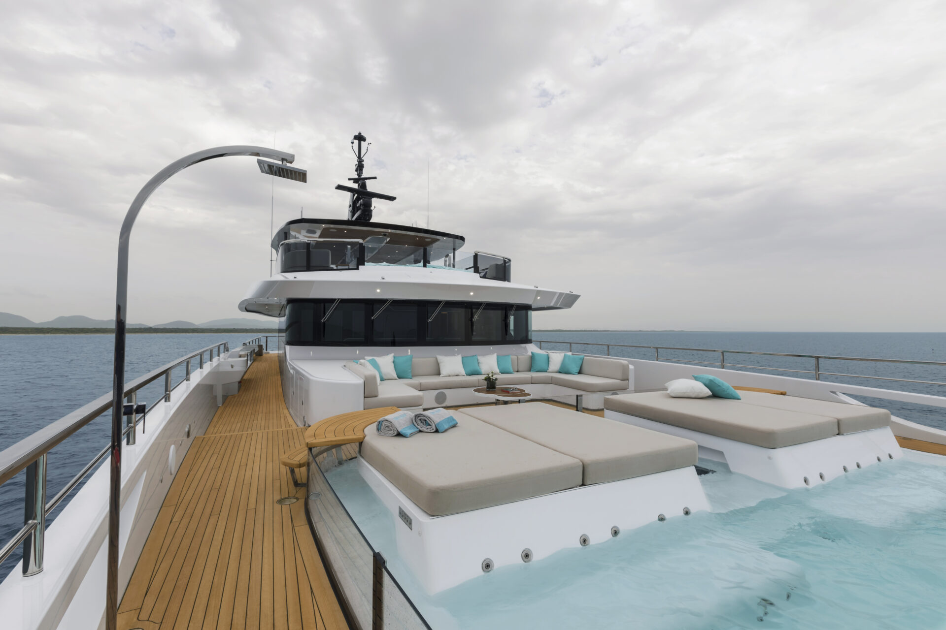 Luxurious deck of Mangusta Yachts with ocean view.