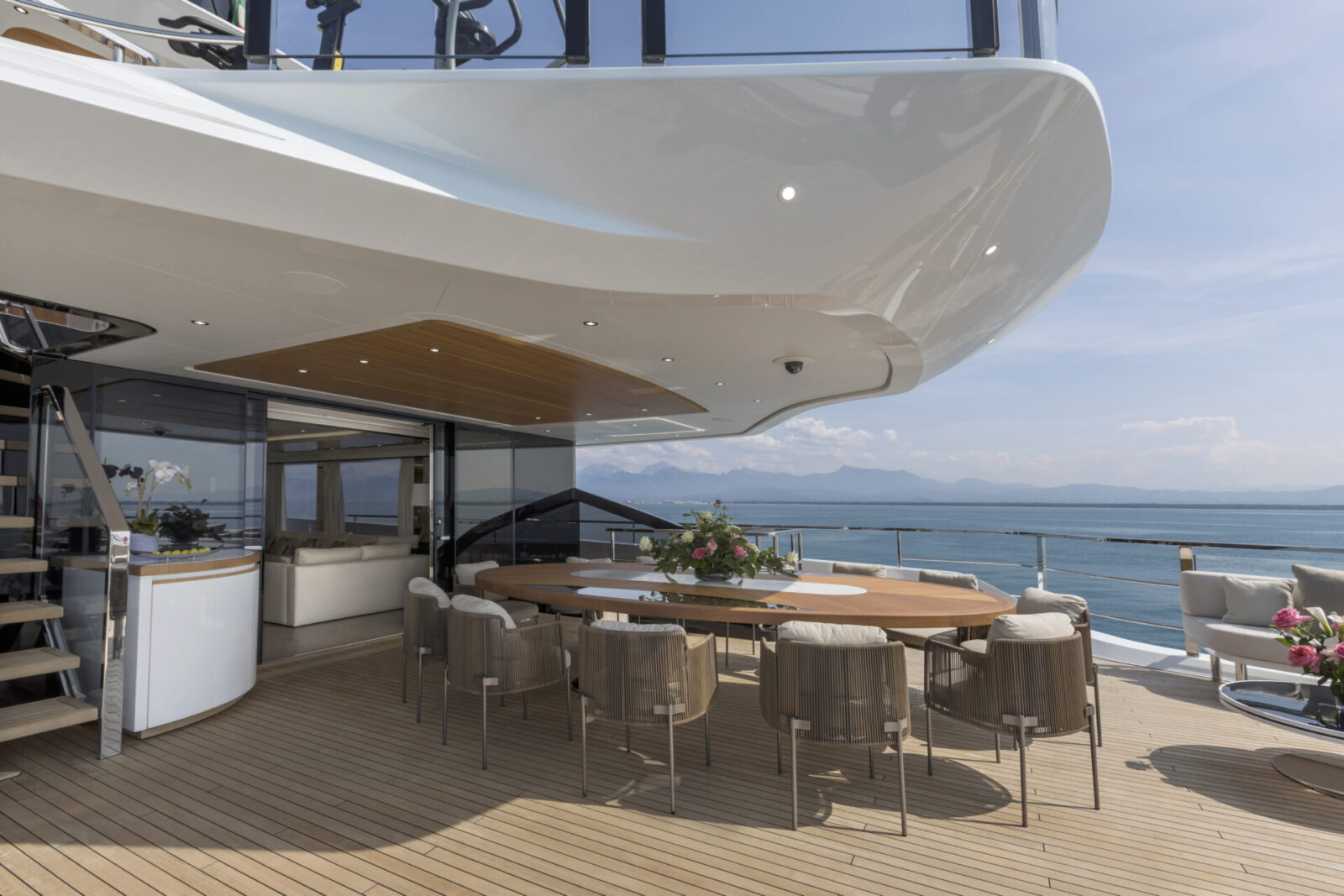 Luxury yacht deck with ocean view dining area