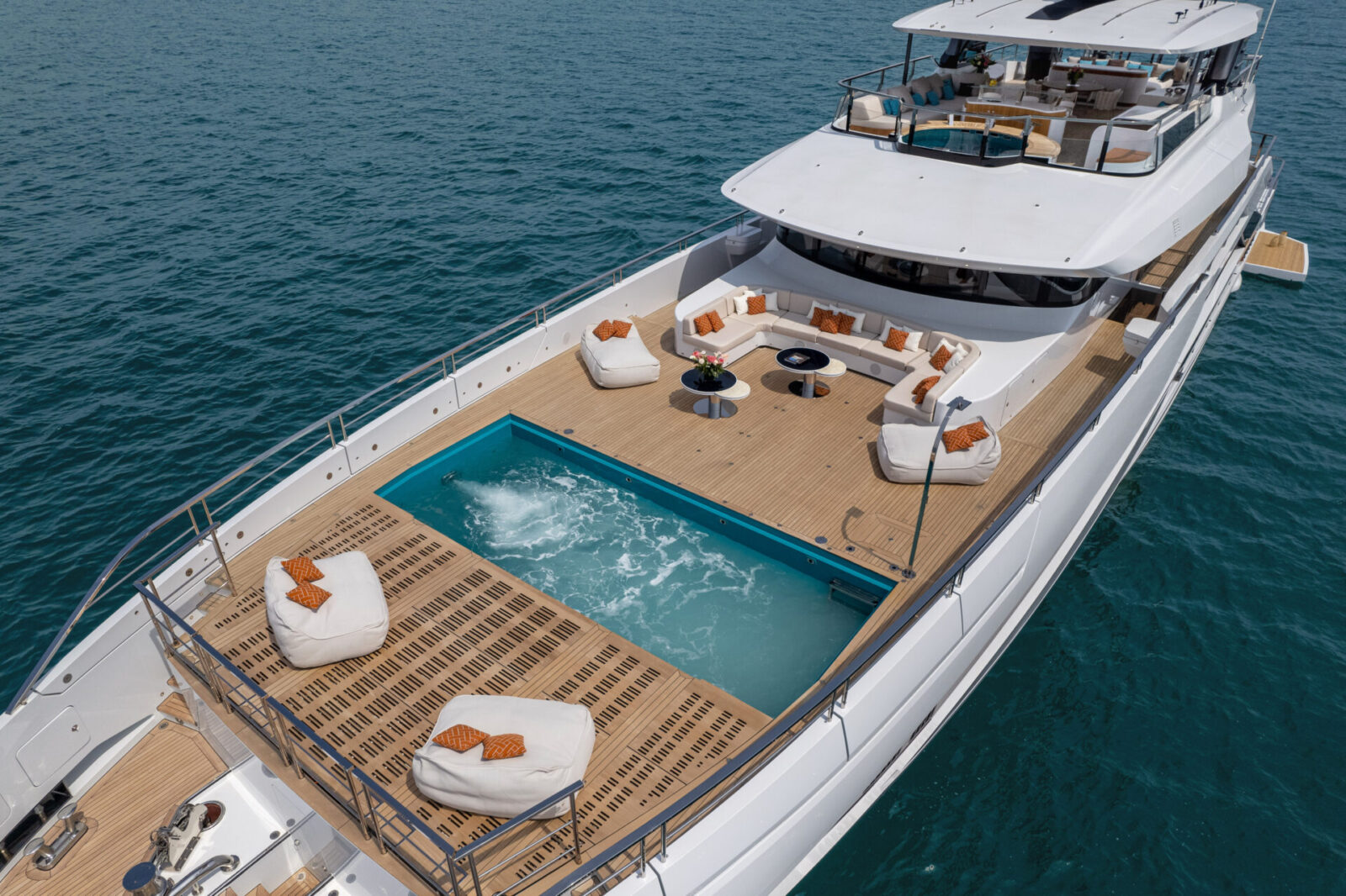 Mangusta yacht deck with luxurious pool and seating