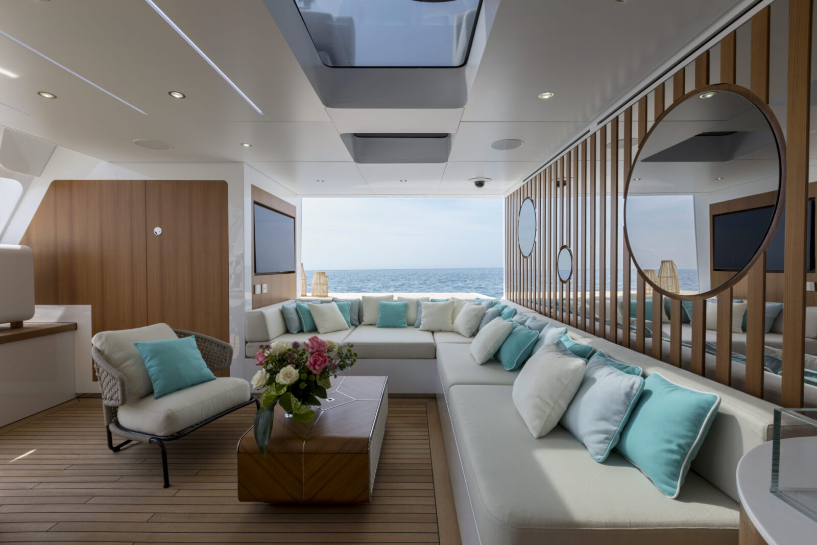 Luxurious yacht interior with ocean view.