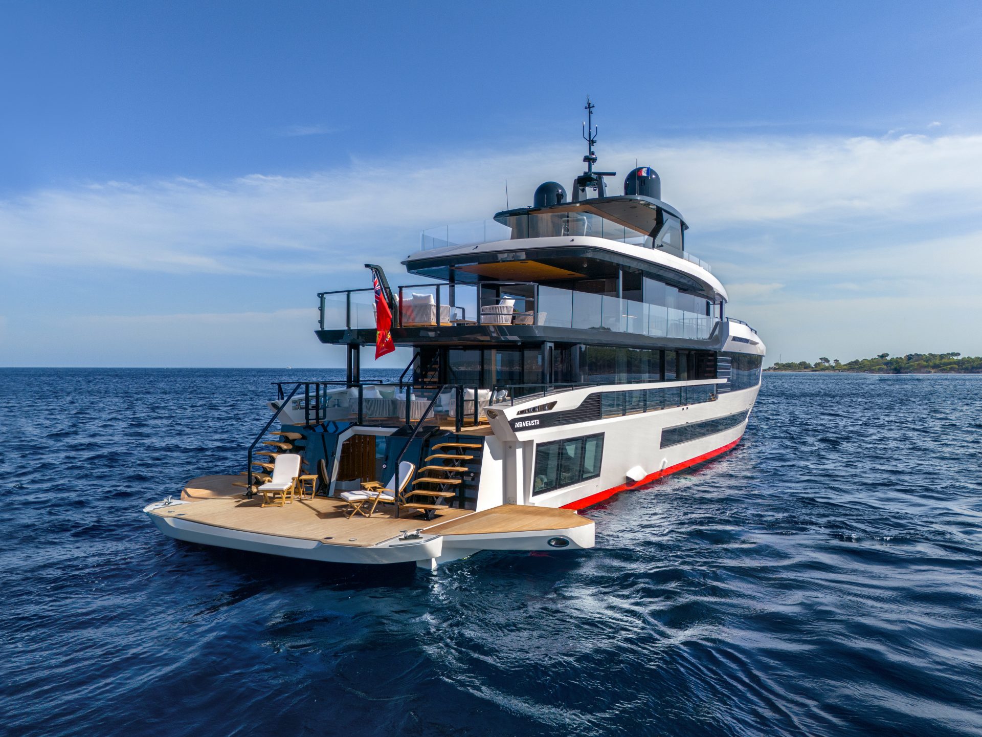 Mangusta yacht cruising on open sea.