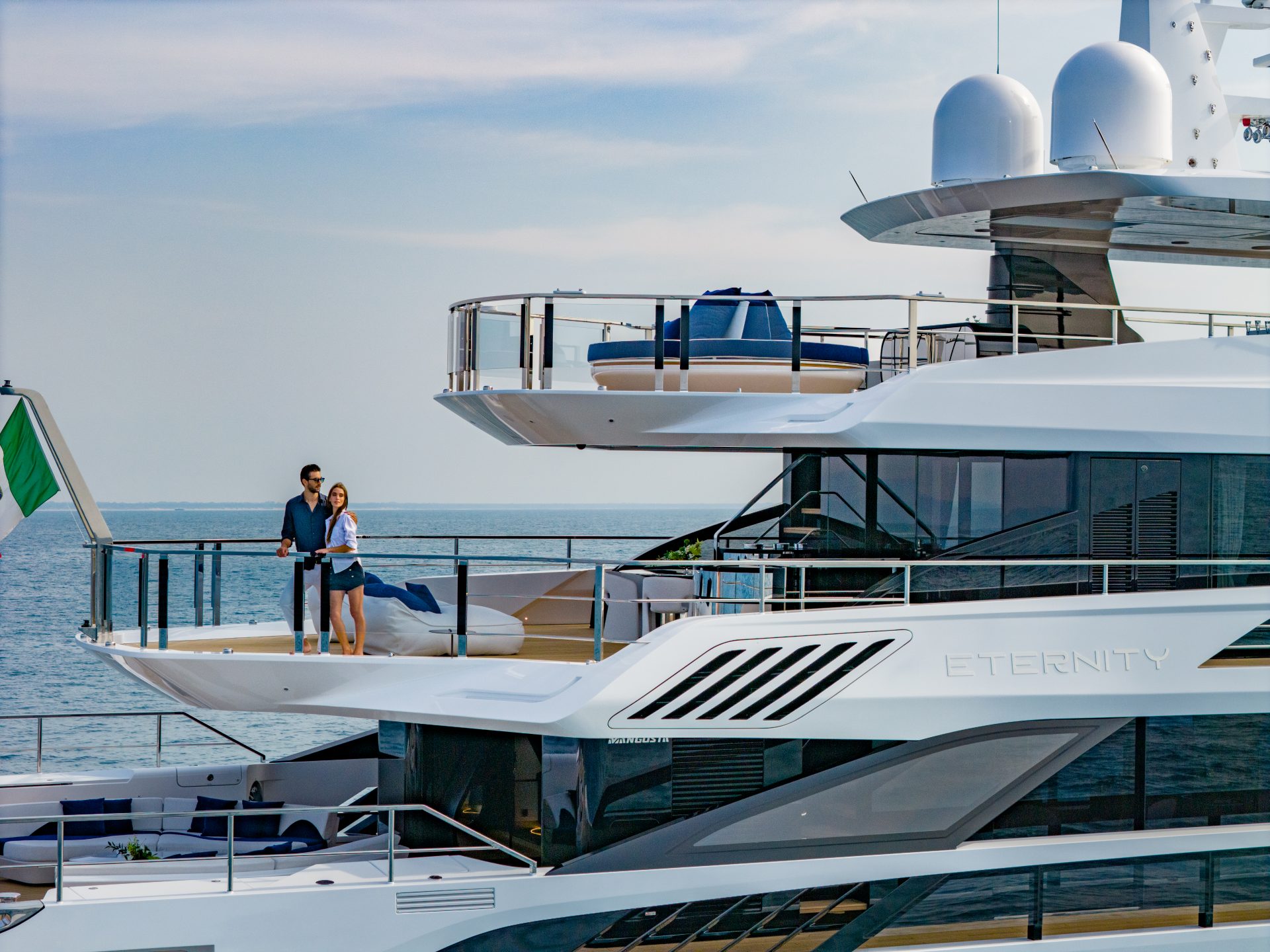 Couple enjoying luxury on Mangusta Yacht deck