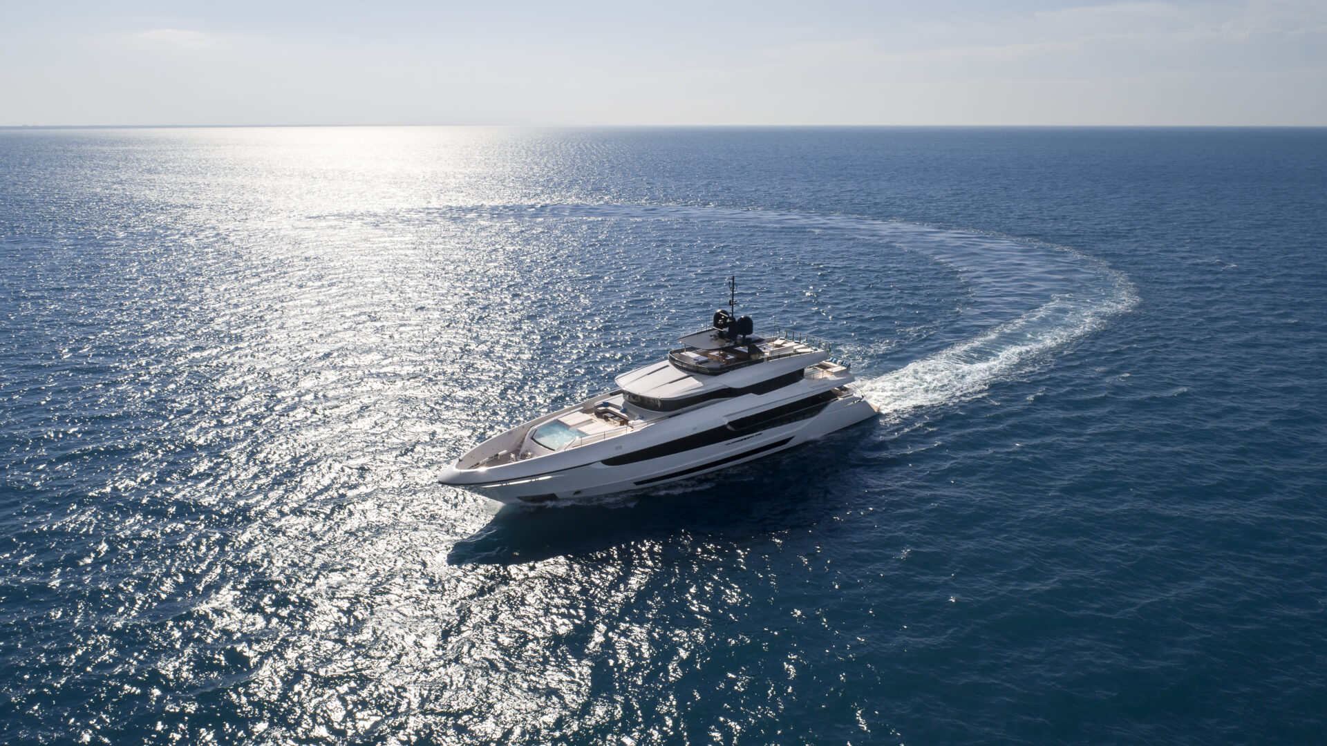 Mangusta yacht cruising on open sea.