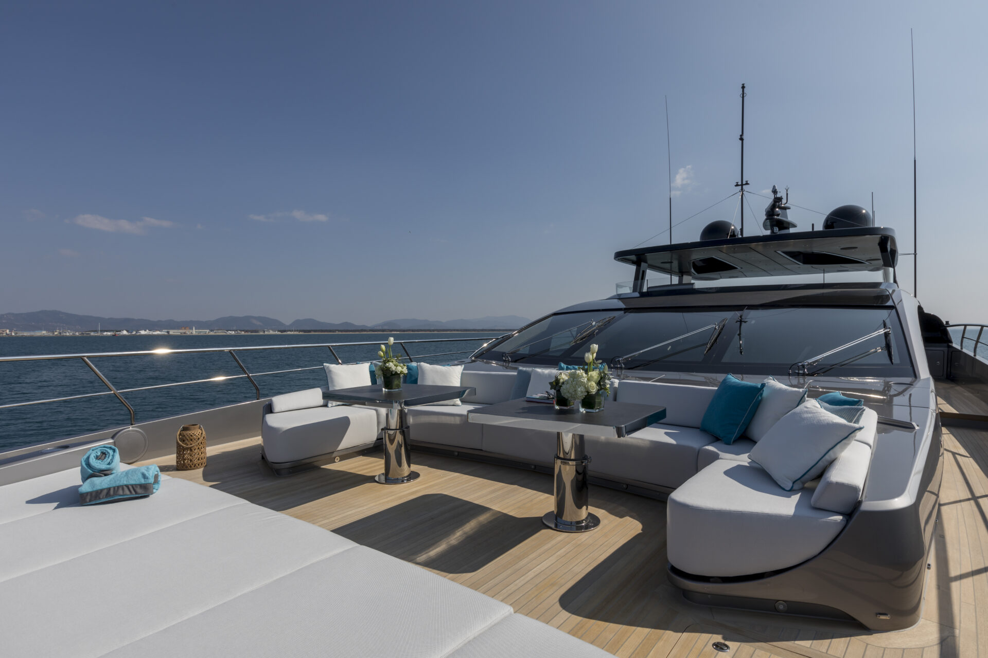 Luxury yacht deck with elegant seating area.