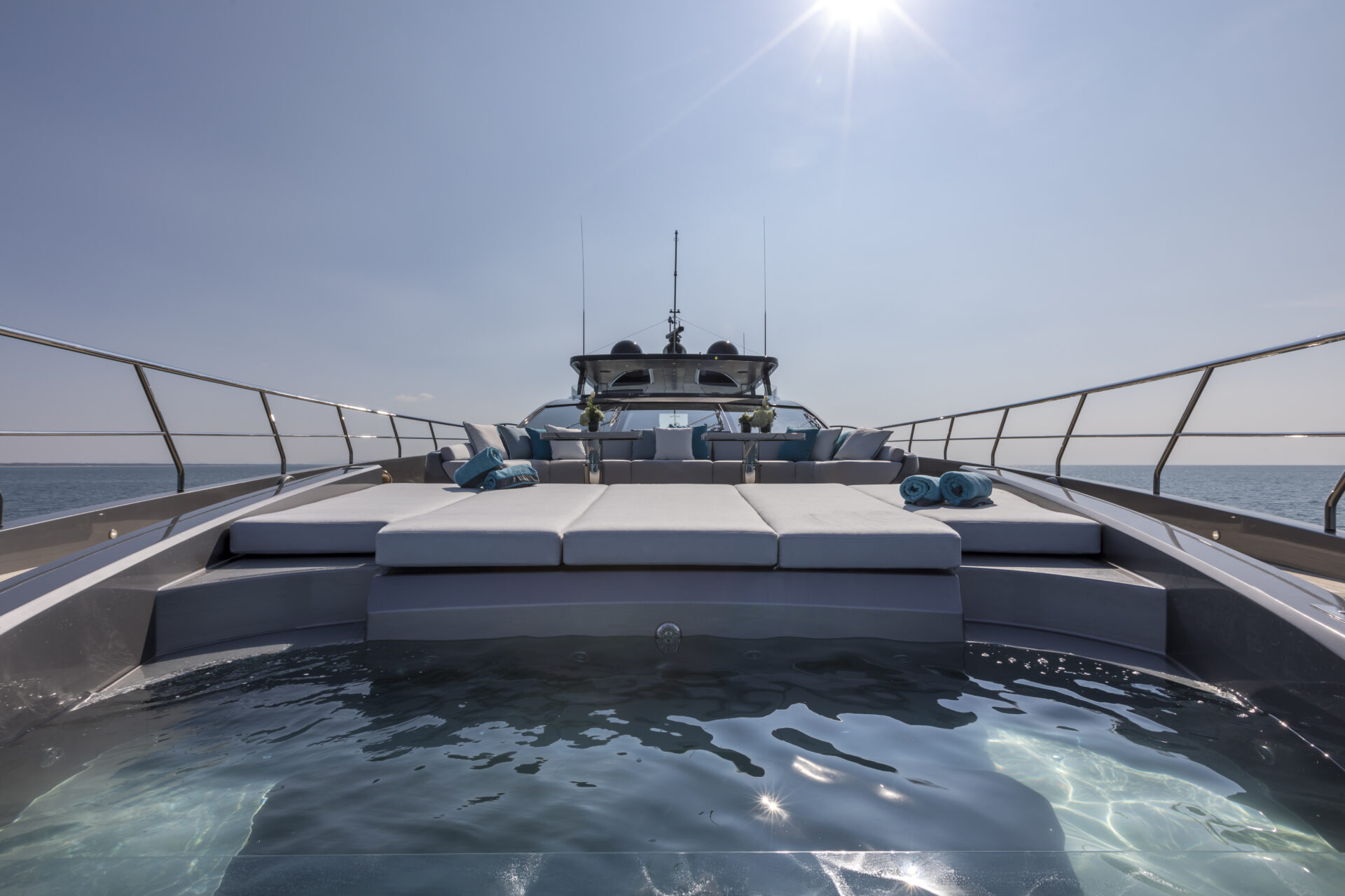 Luxury yacht sundeck with pool and ocean view