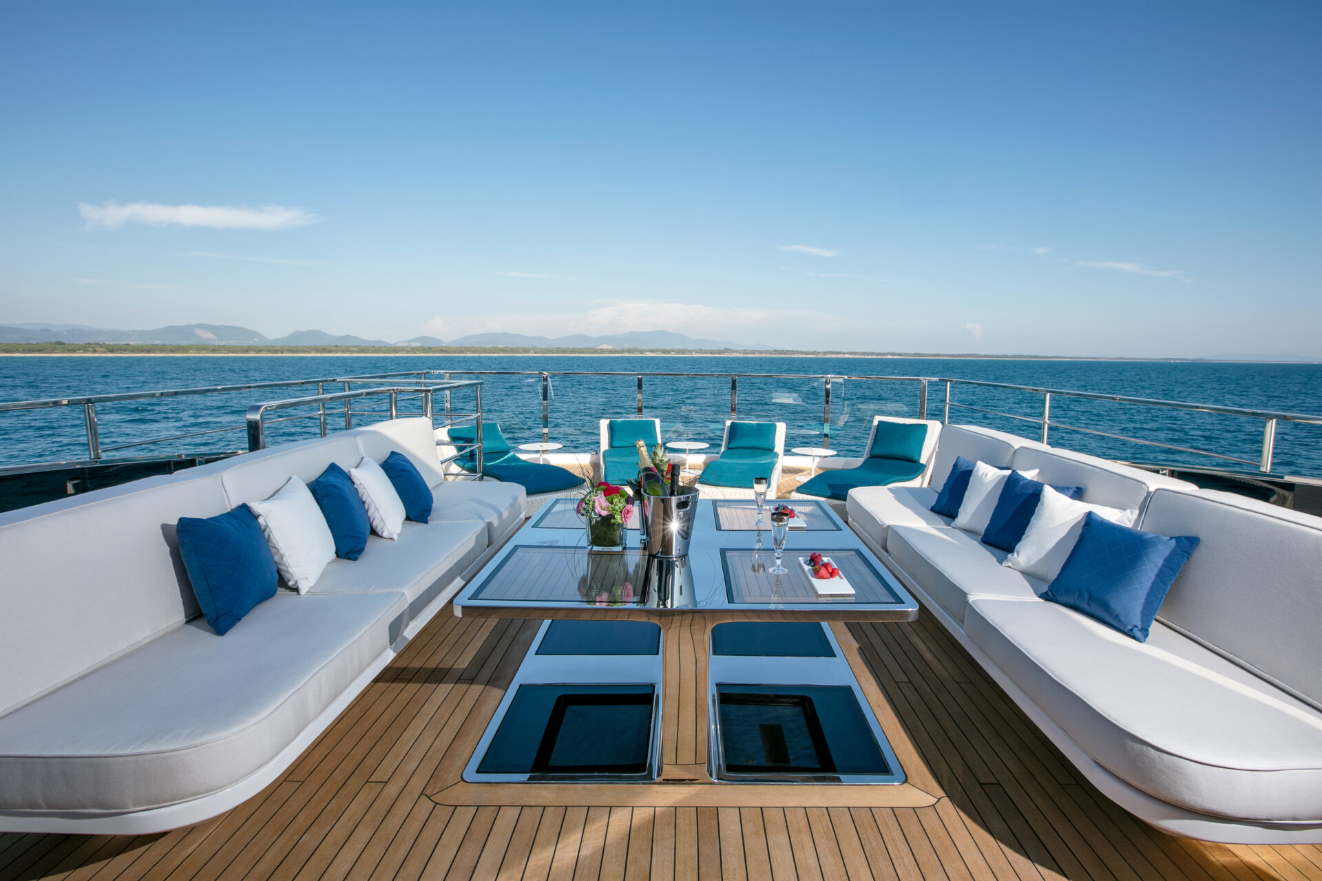 Luxurious deck seating on Mangusta yacht.