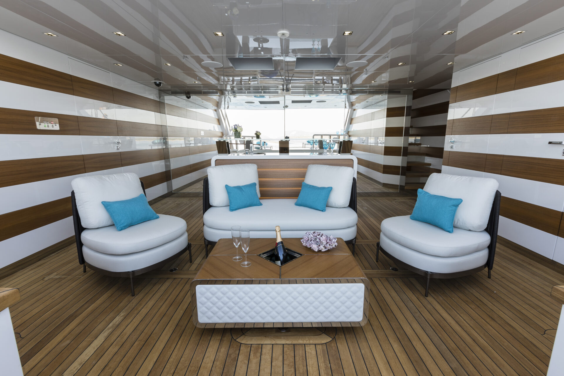Luxurious Mangusta yacht deck seating area.