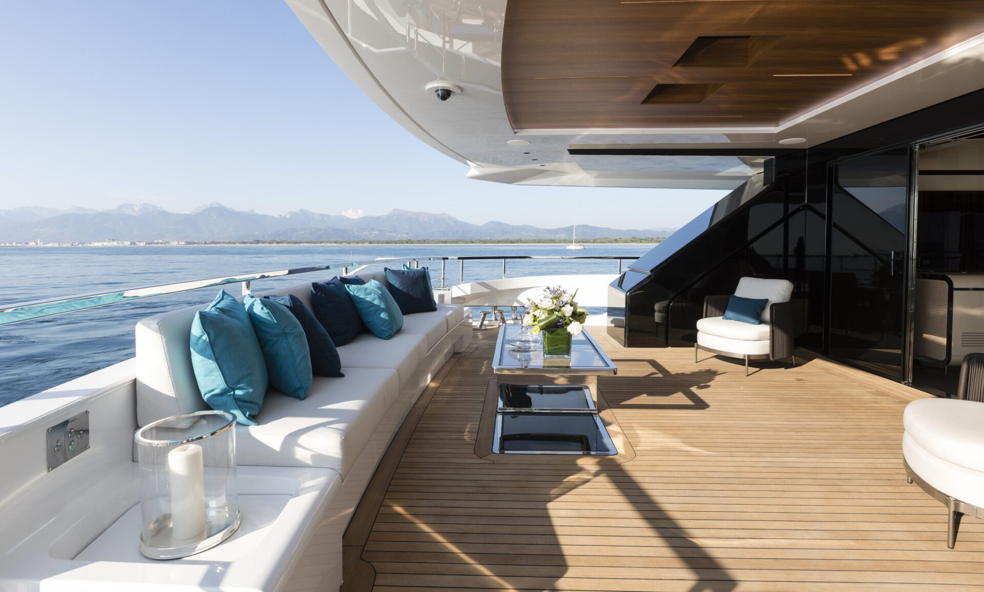 Luxury yacht deck with sea and mountain view