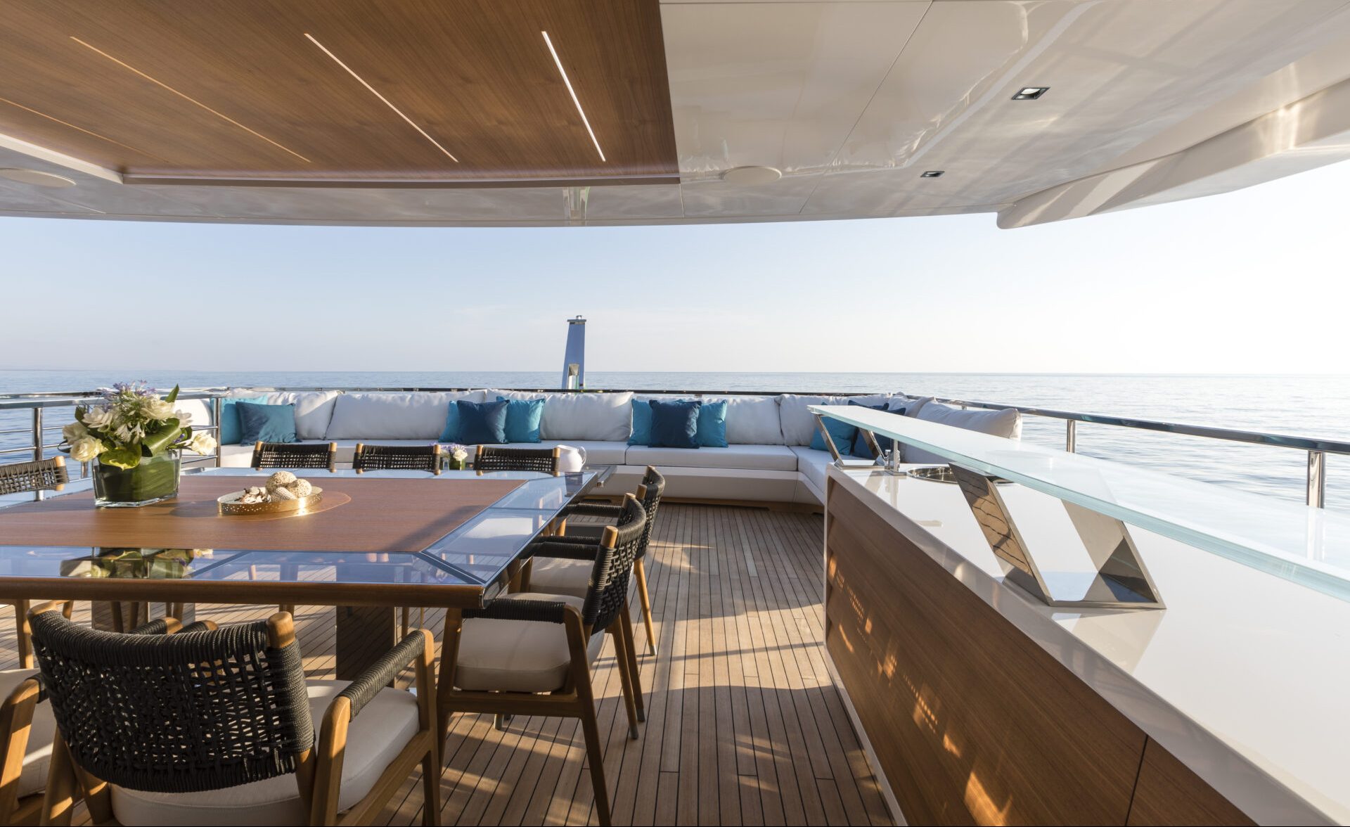 Luxury yacht deck with ocean view dining area