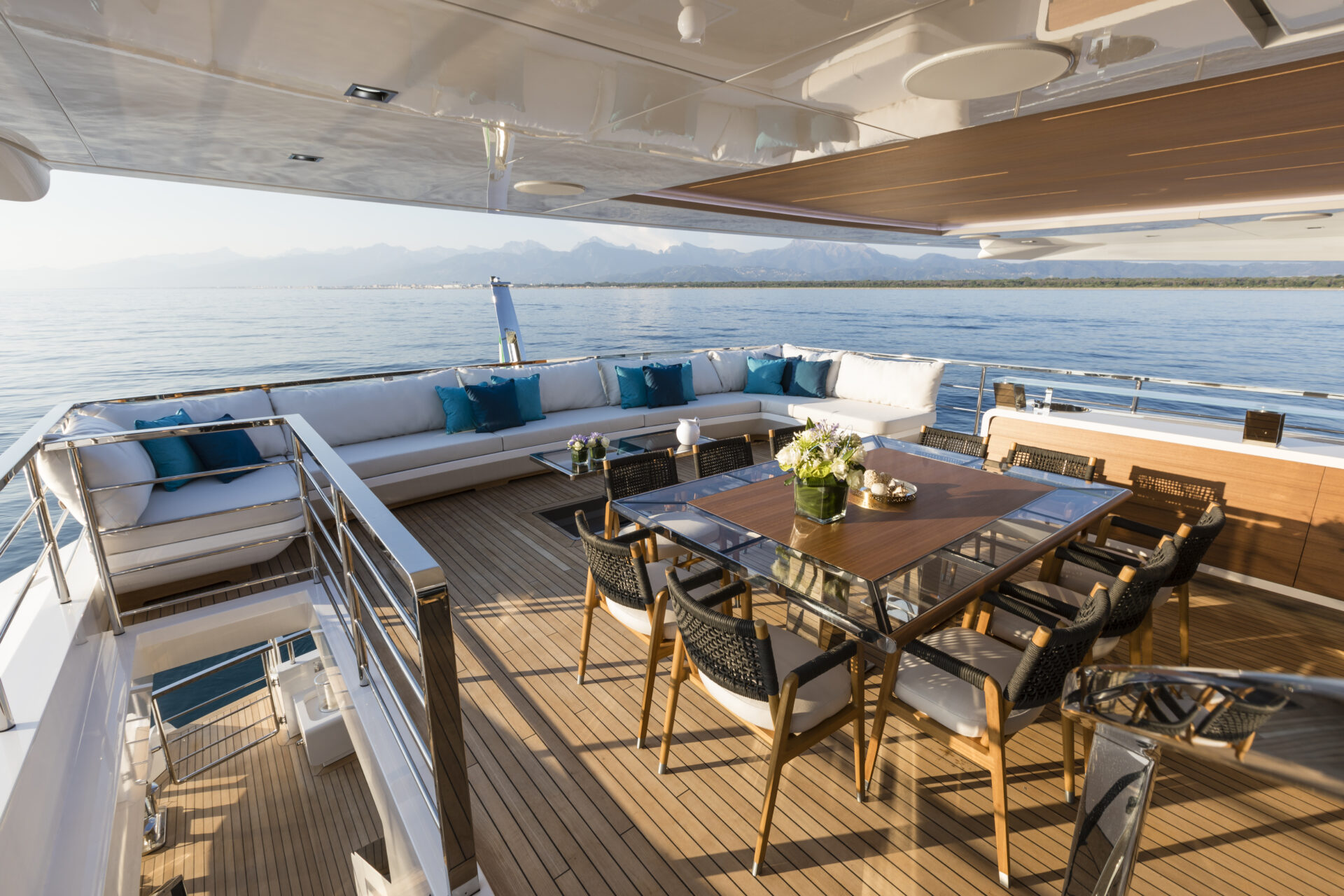 Luxurious deck dining area on Mangusta Yacht