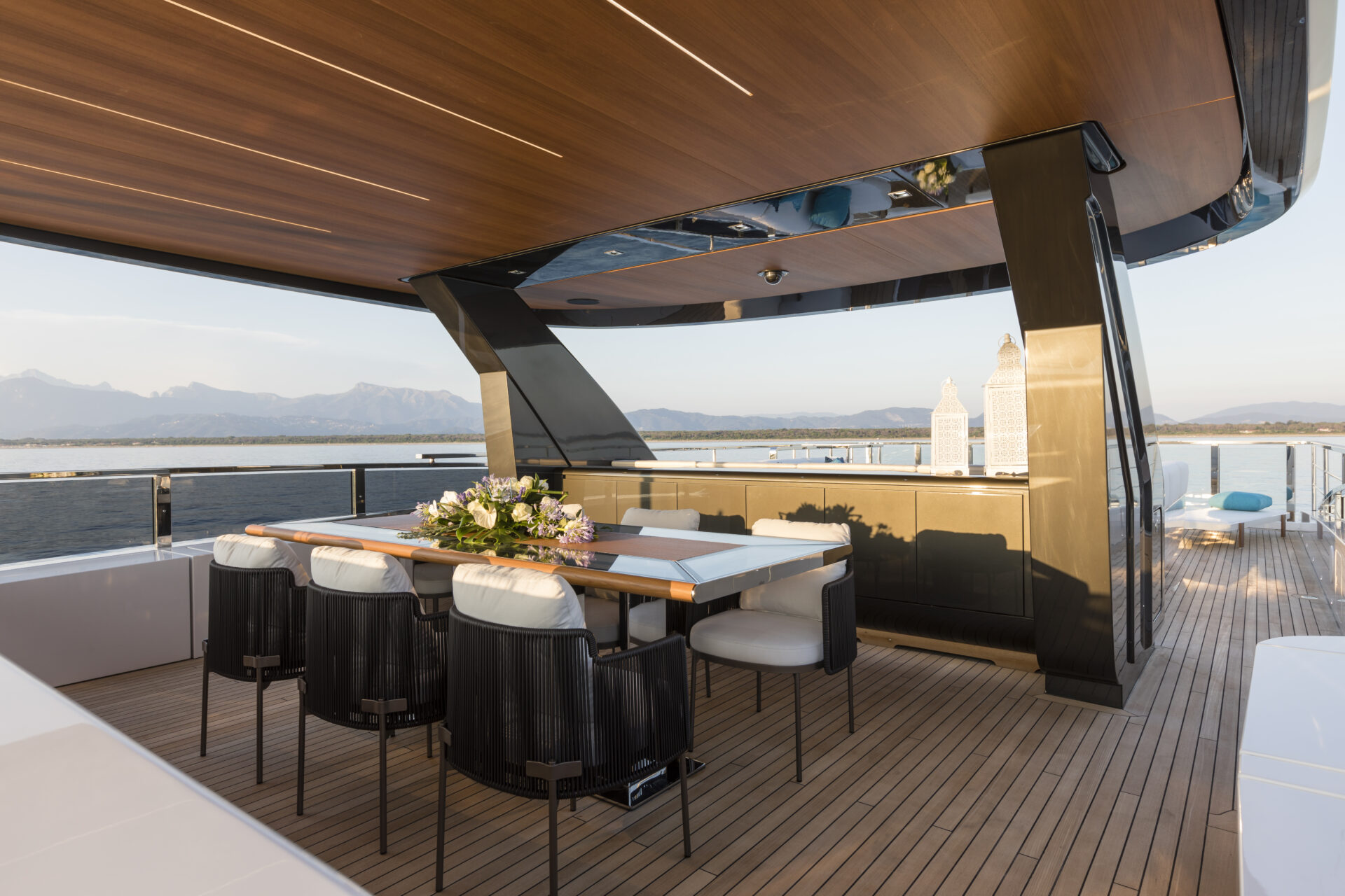 Luxurious deck dining area on Mangusta Yacht