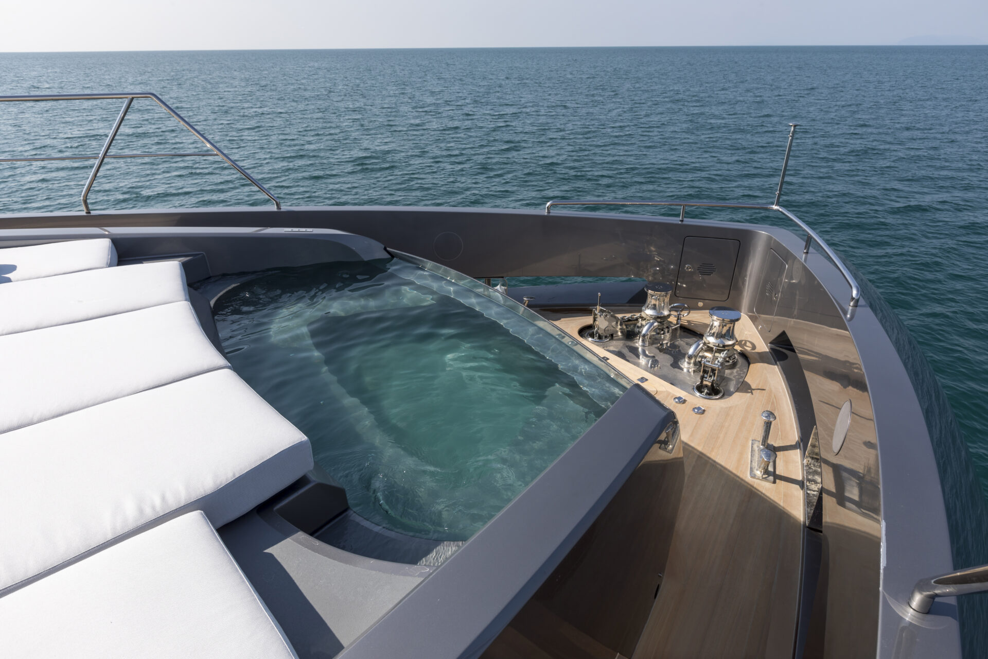 Luxury yacht bow with jacuzzi and sea view