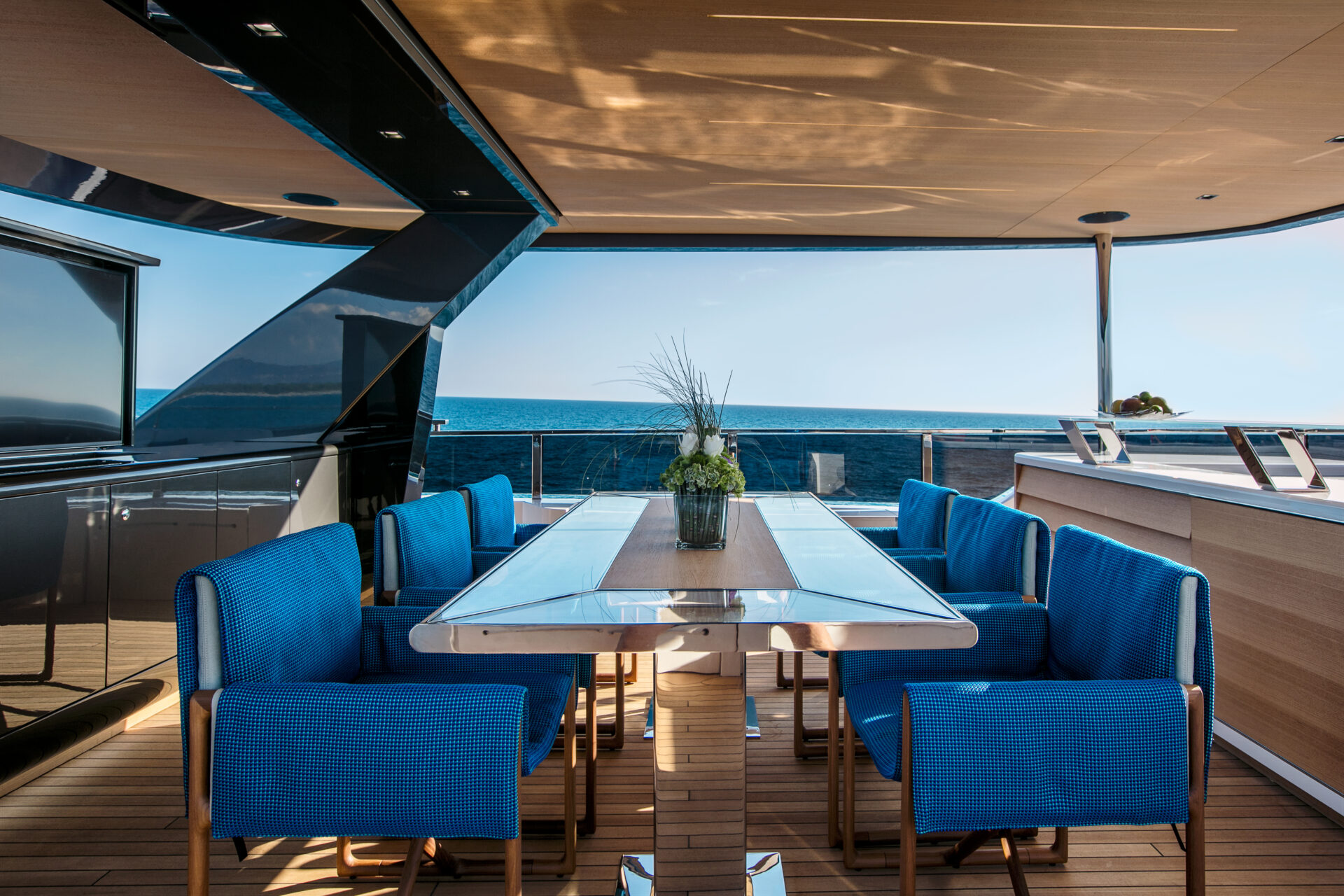 Luxury yacht deck with ocean view.