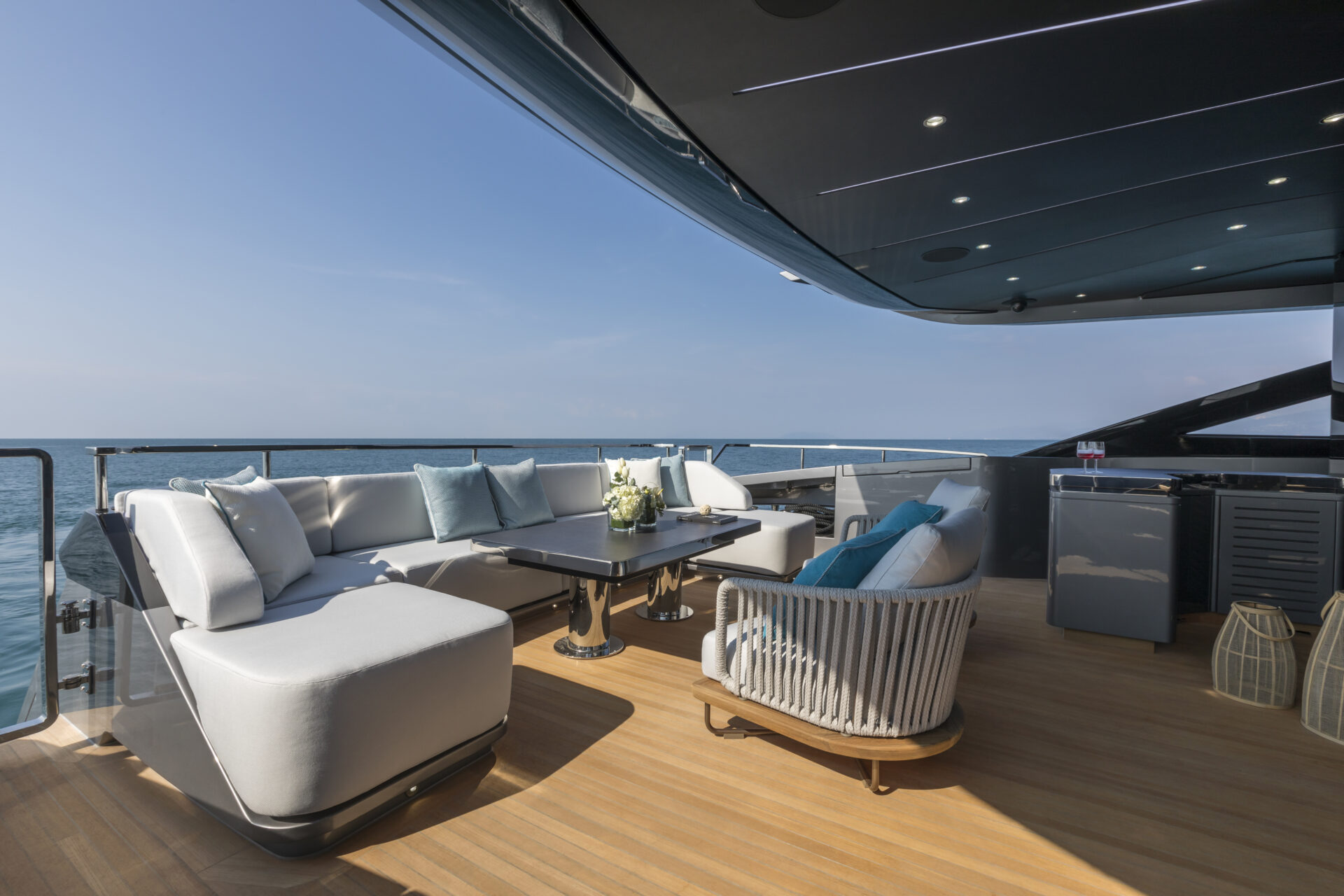 Luxury deck seating on Mangusta yacht