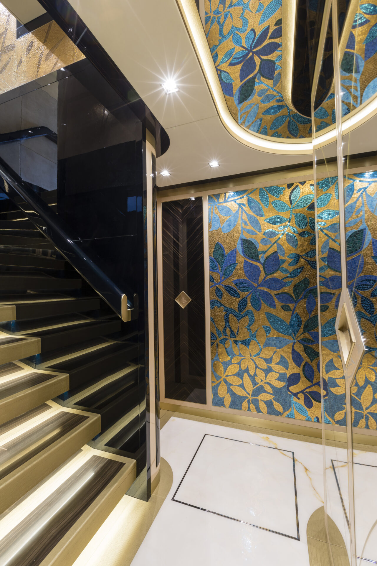 Luxurious yacht interior with mosaic artwork.