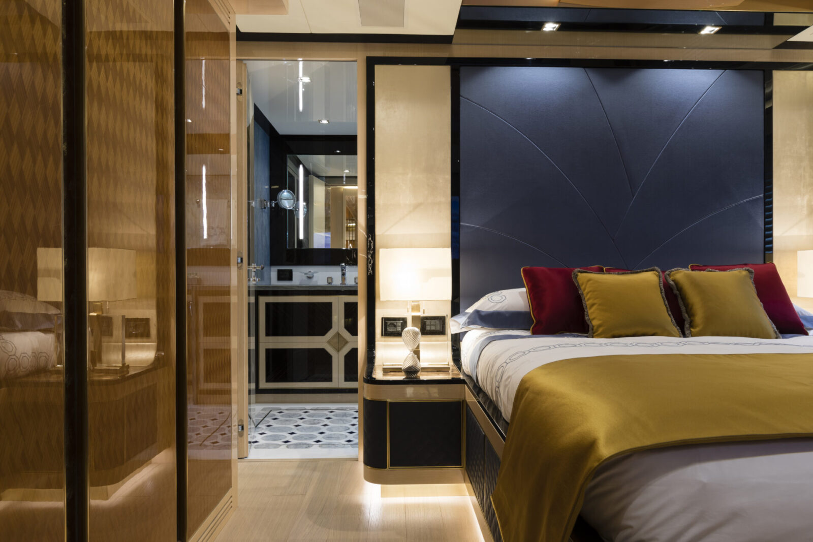 Luxurious yacht bedroom with modern decor.