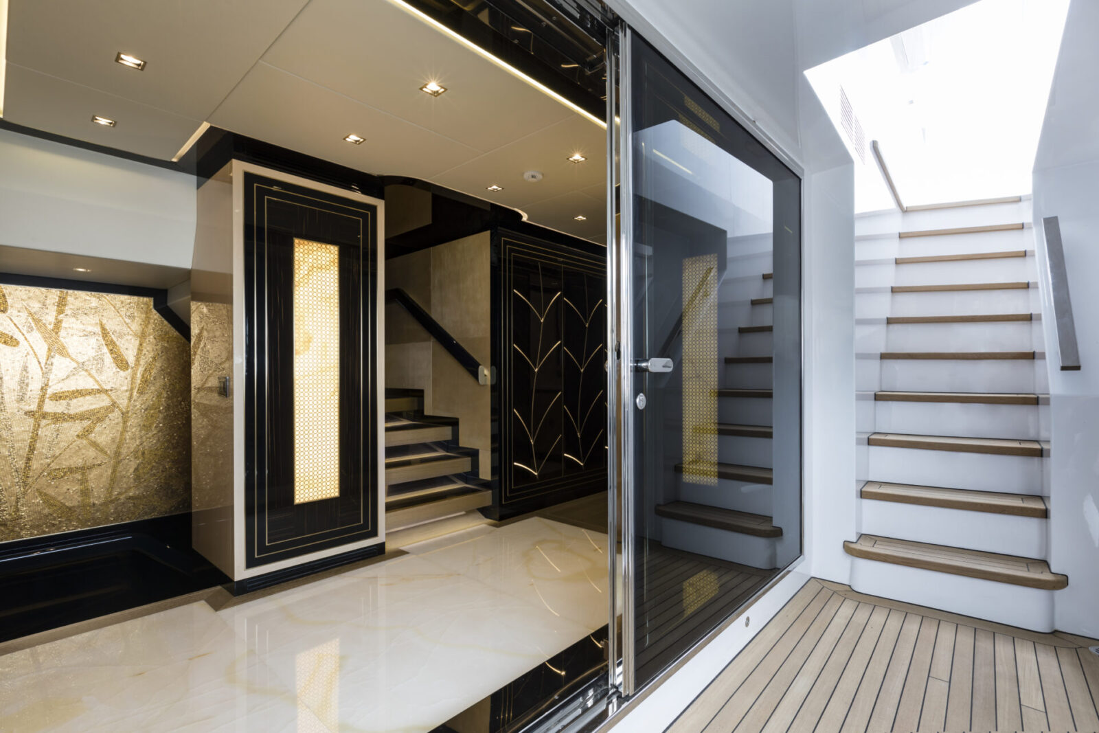 Luxurious interior of Mangusta yacht staircase.
