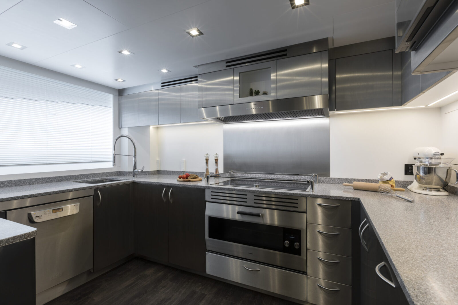 Sleek modern yacht kitchen with stainless steel accents.