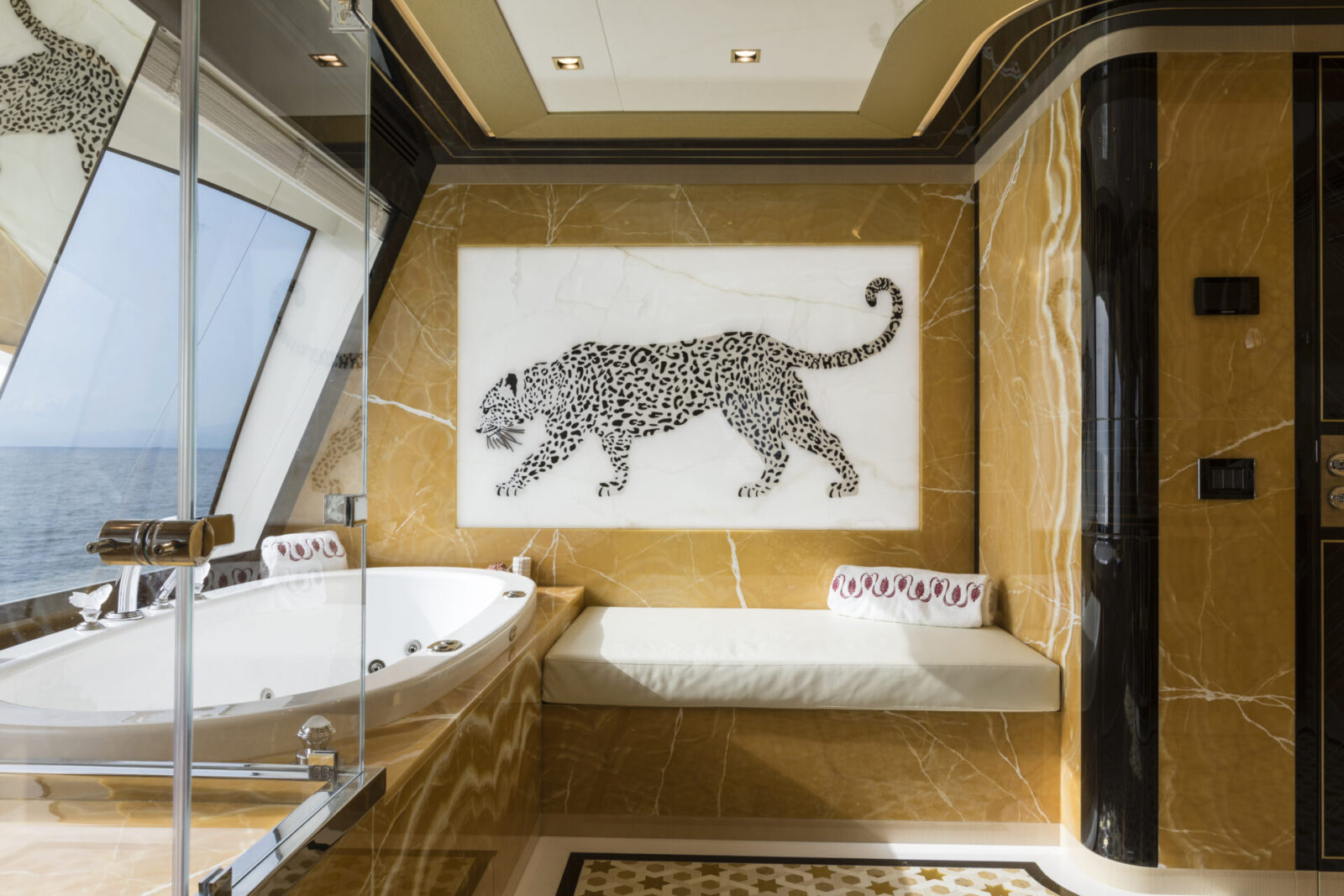 Luxury yacht bathroom with leopard wall art