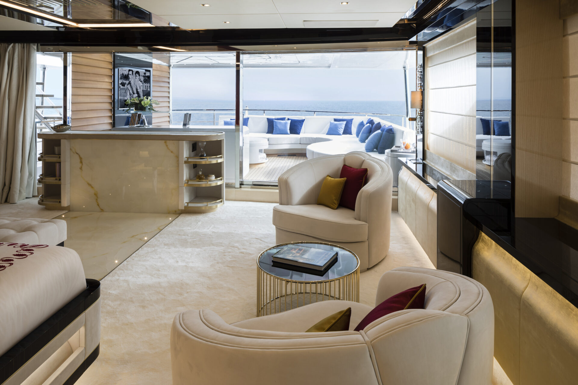 Luxurious Mangusta yacht interior lounge area.